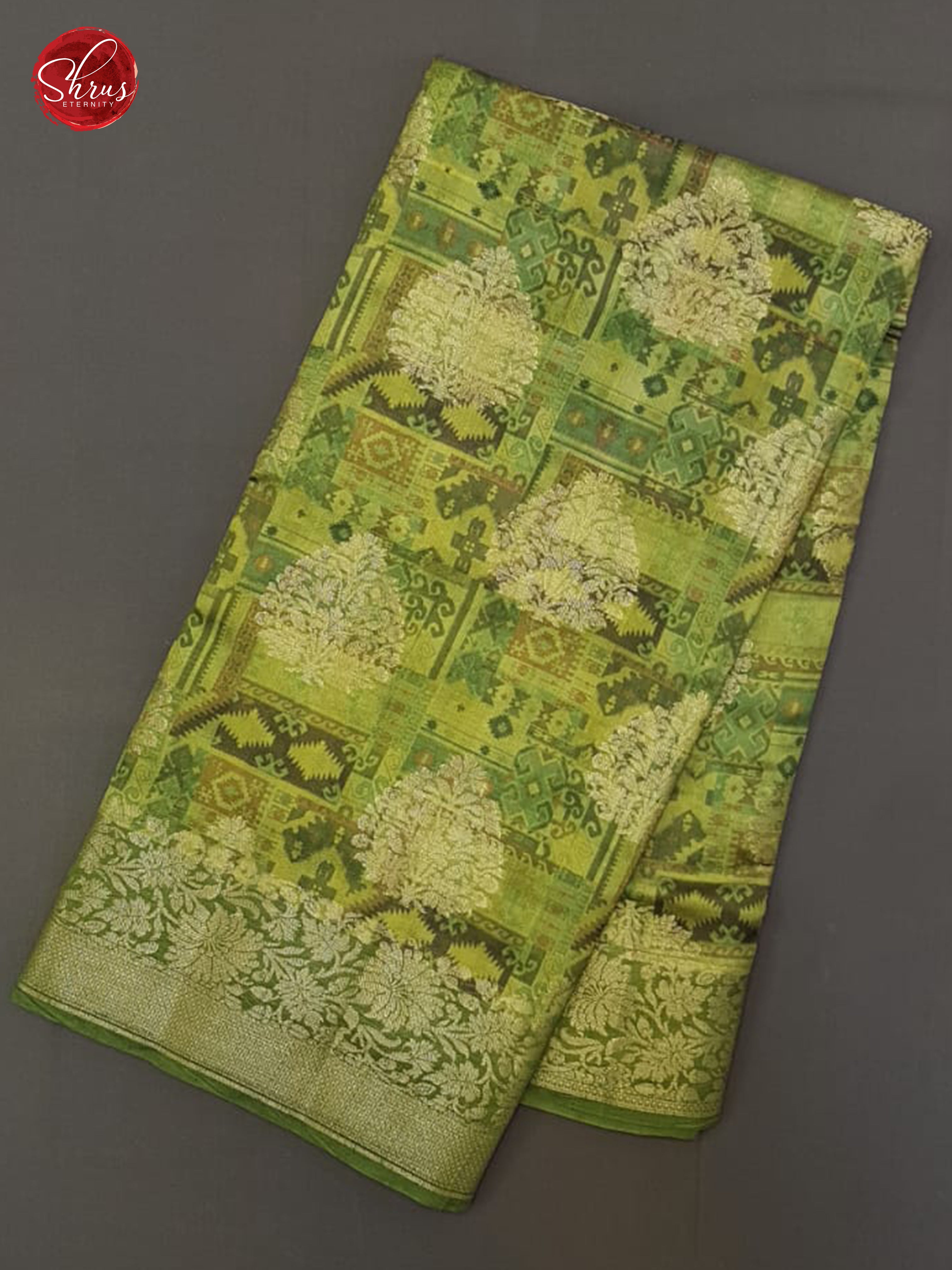 Green(Single Tone)- Tussar with floral print , zari motifs on the body& Zari Border - 1