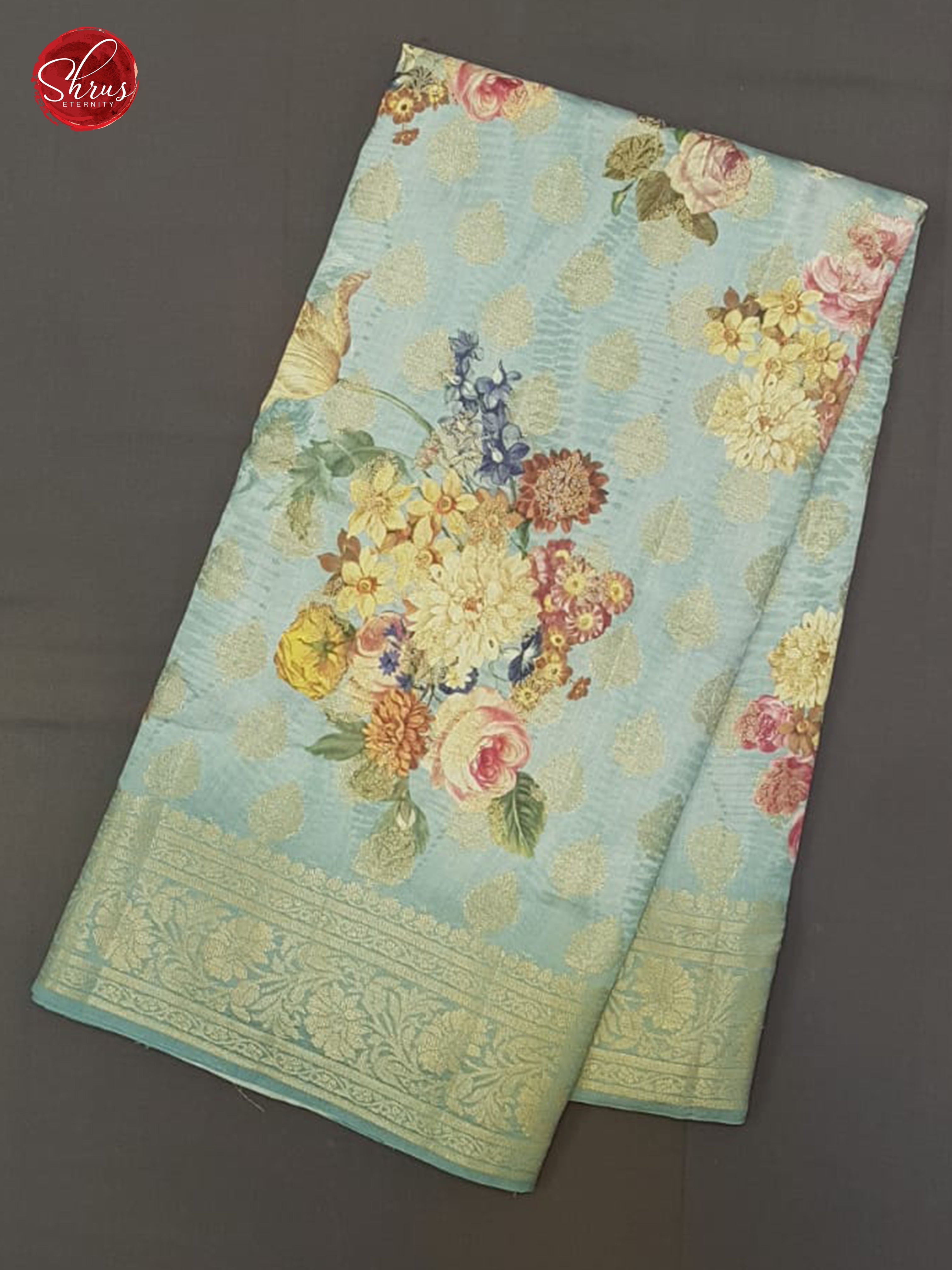 Blue(Single Tone)- Tussar with floral print , zari buttas on the body& Zari Border - Shop on ShrusEternity.com