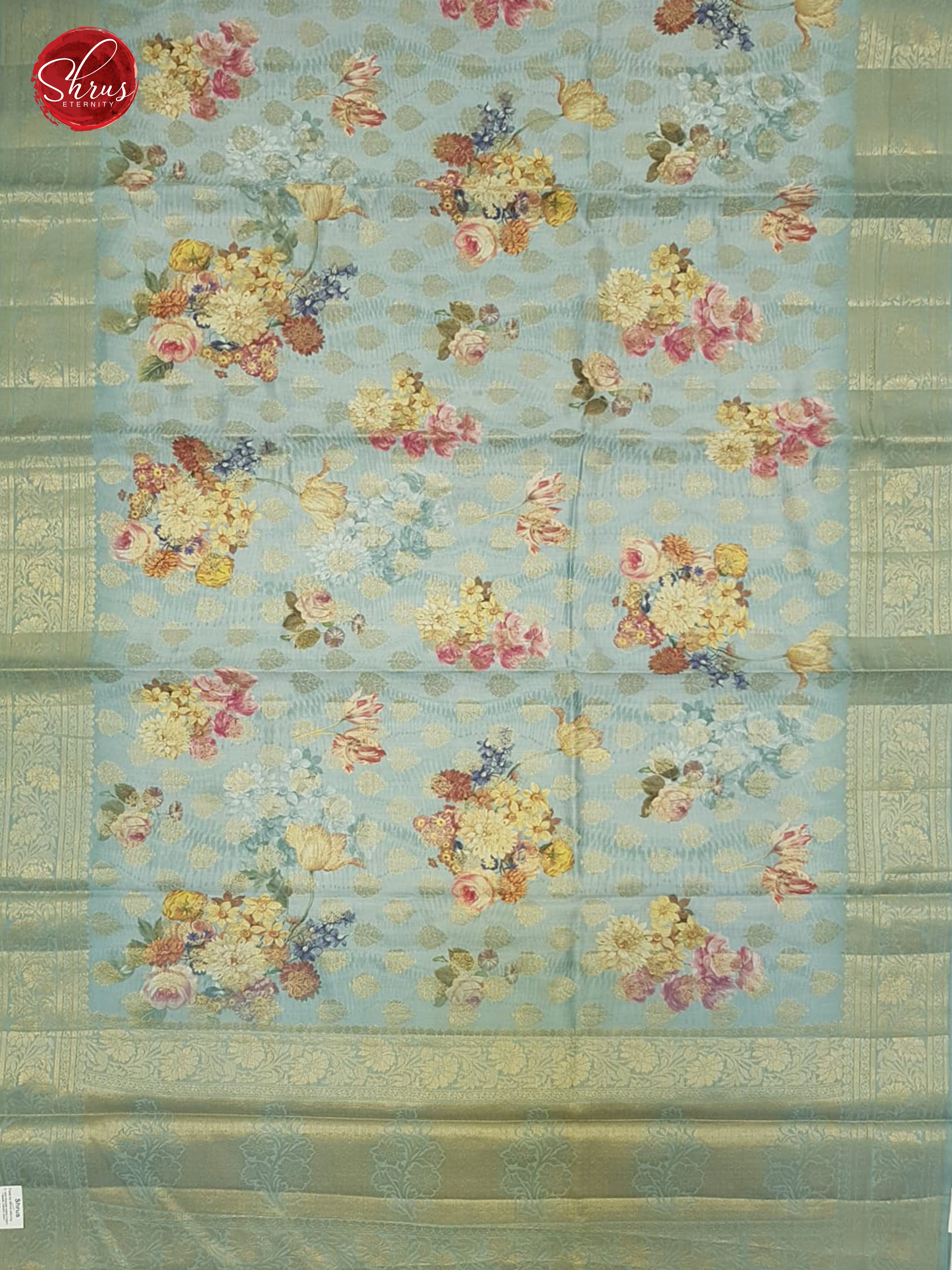 Blue(Single Tone)- Tussar with floral print , zari buttas on the body& Zari Border - Shop on ShrusEternity.com