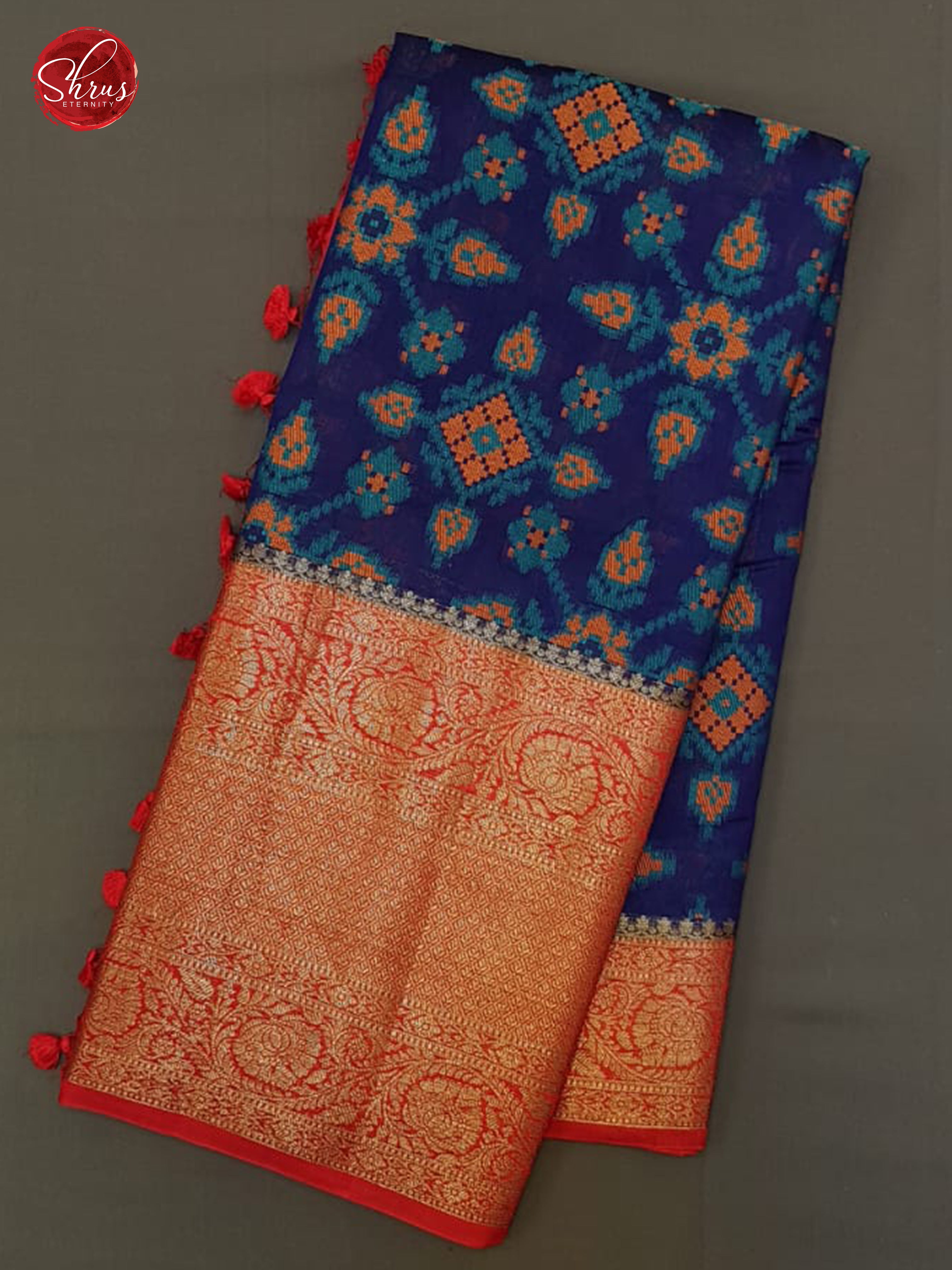 Blue & Red- Tussar with floral pattern on the body & contrast zari Border - Shop on ShrusEternity.com