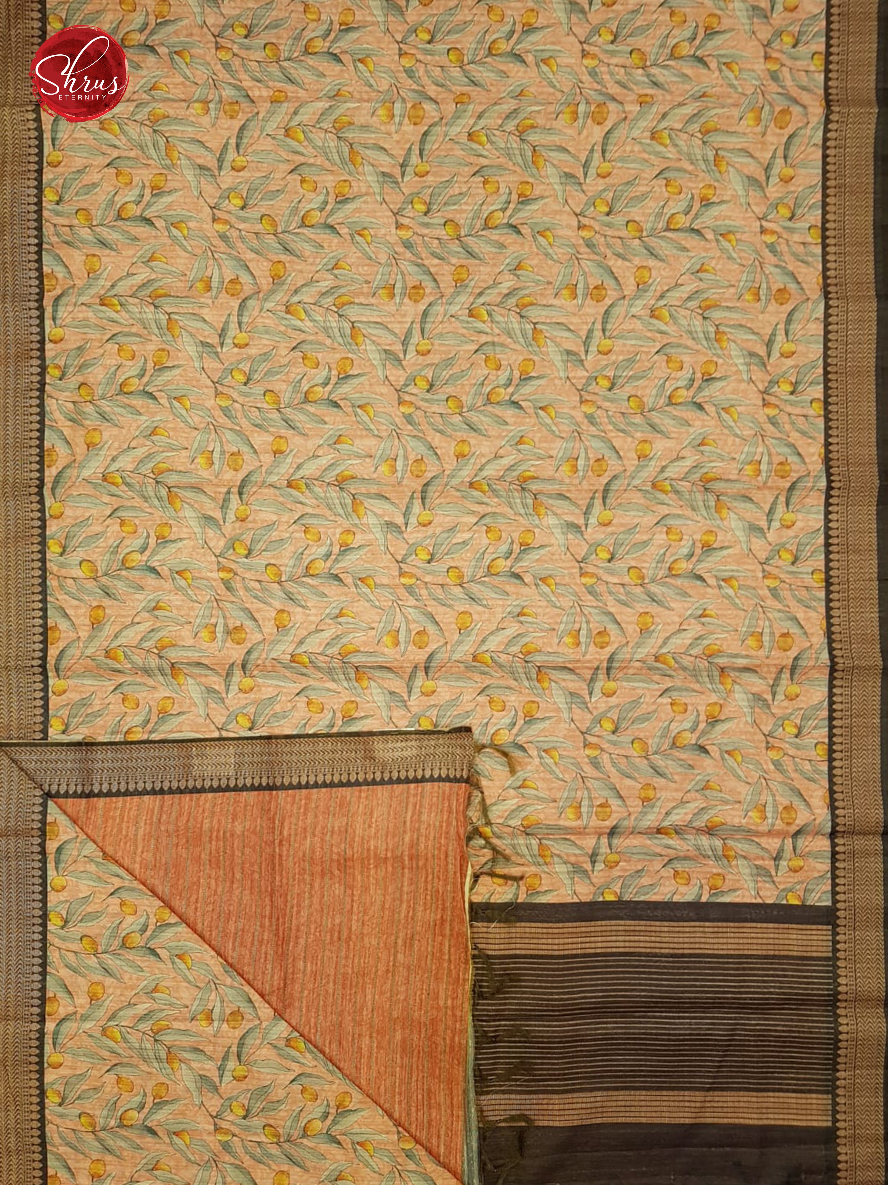 Peachish pink & Brown - Semi Gicha with floral print on the body & Zari Border - Shop on ShrusEternity.com