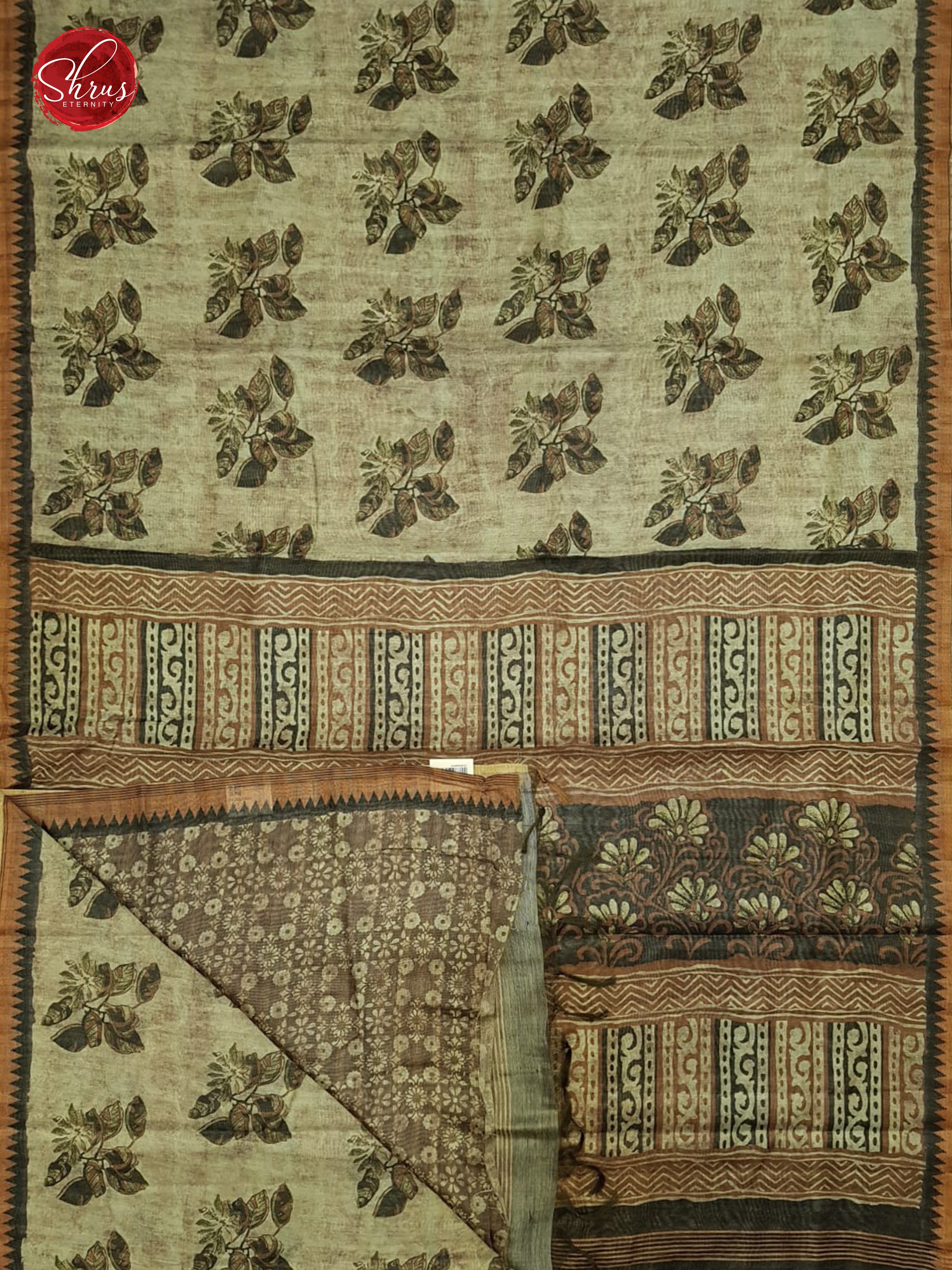 Greyish Green & Brown - Semi Gicha with floral print on the body & Zari Border - Shop on ShrusEternity.com