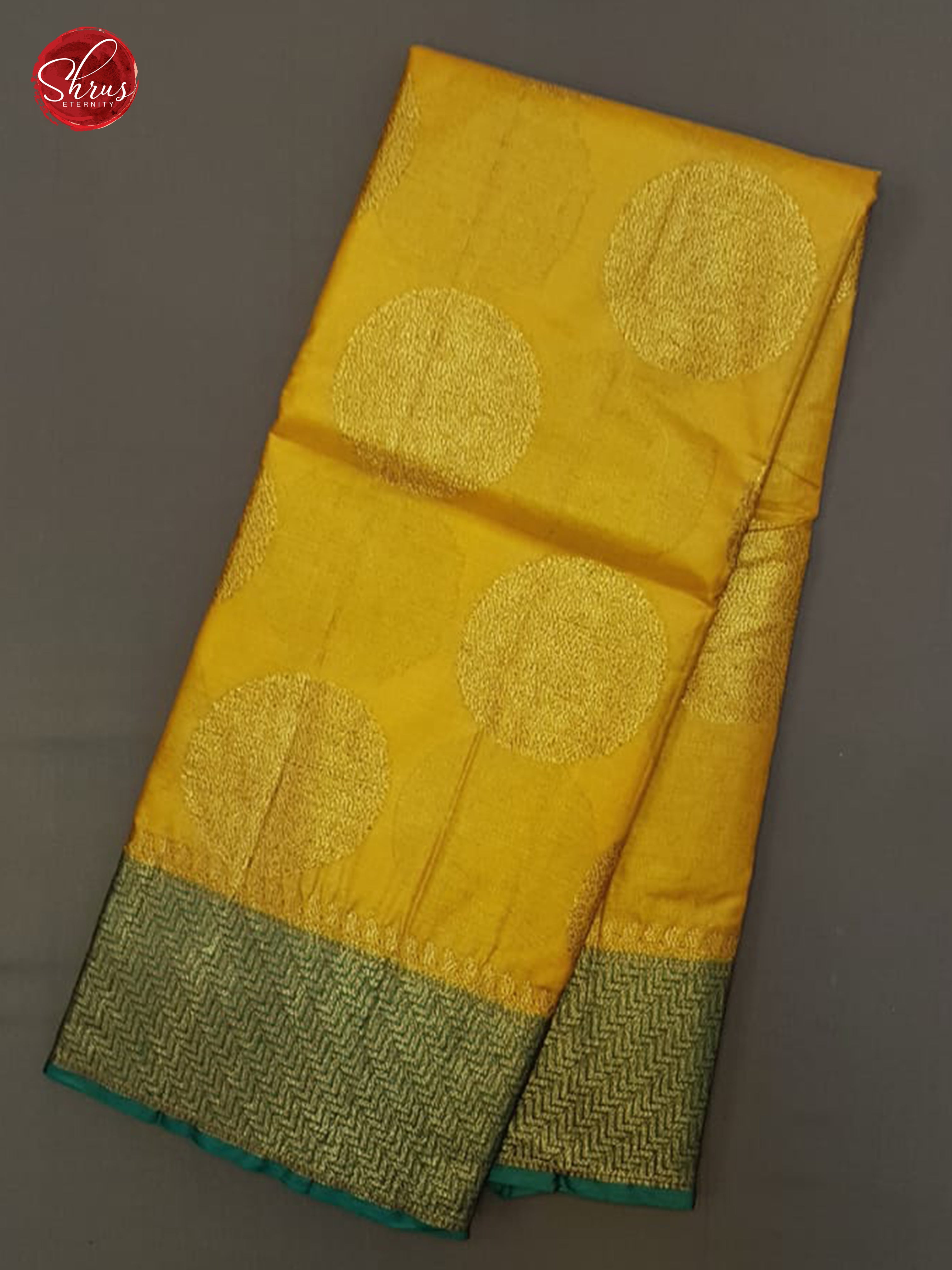 Mustard & Green - Tussar with zari woven floral chakra motifs on the body & Zari Border - Shop on ShrusEternity.com