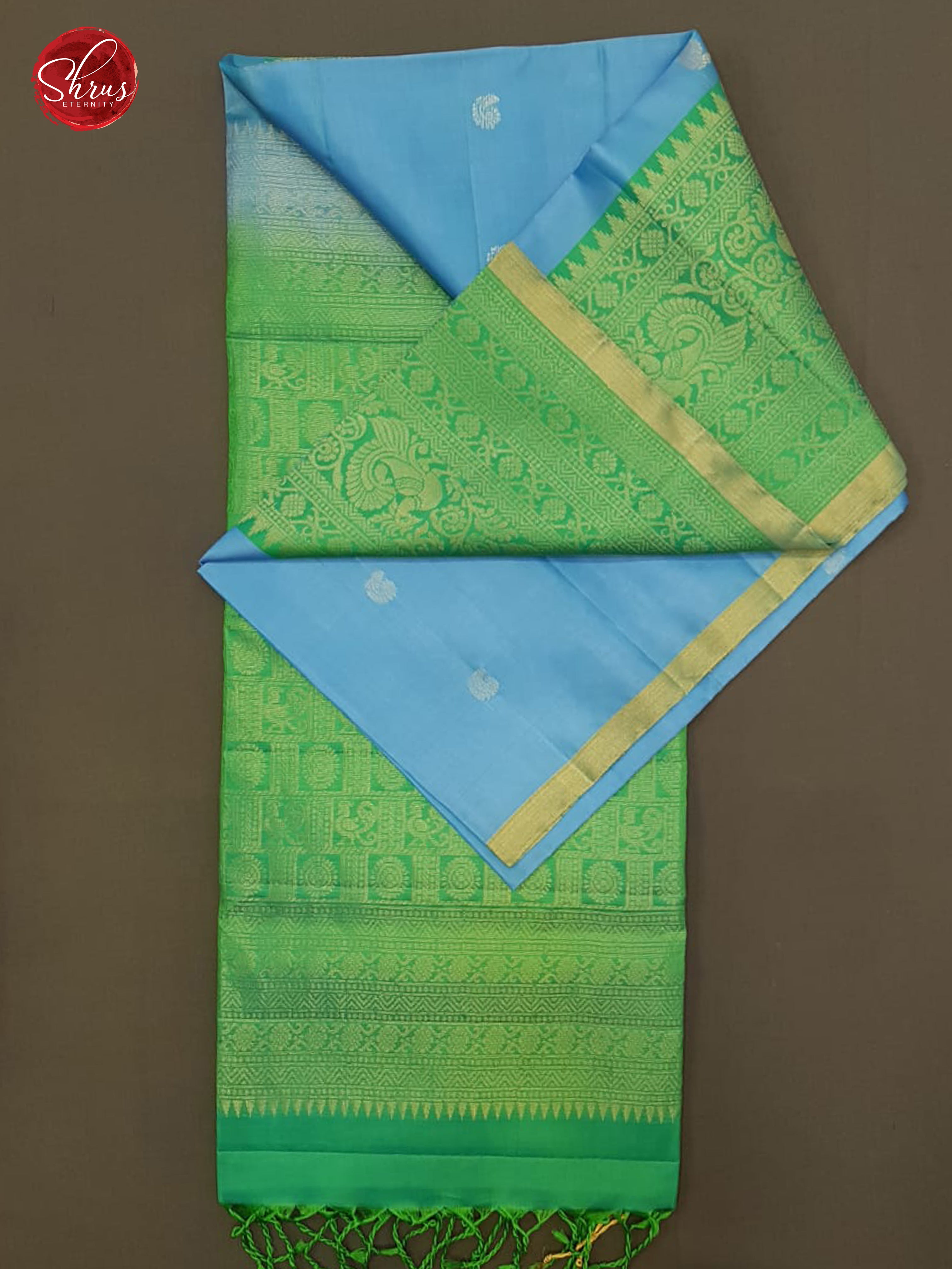 Sky Blue and Green -Silk (half-Pure) with Zari woven buttas on the body & Contrast Zari Border - Shop on ShrusEternity.com