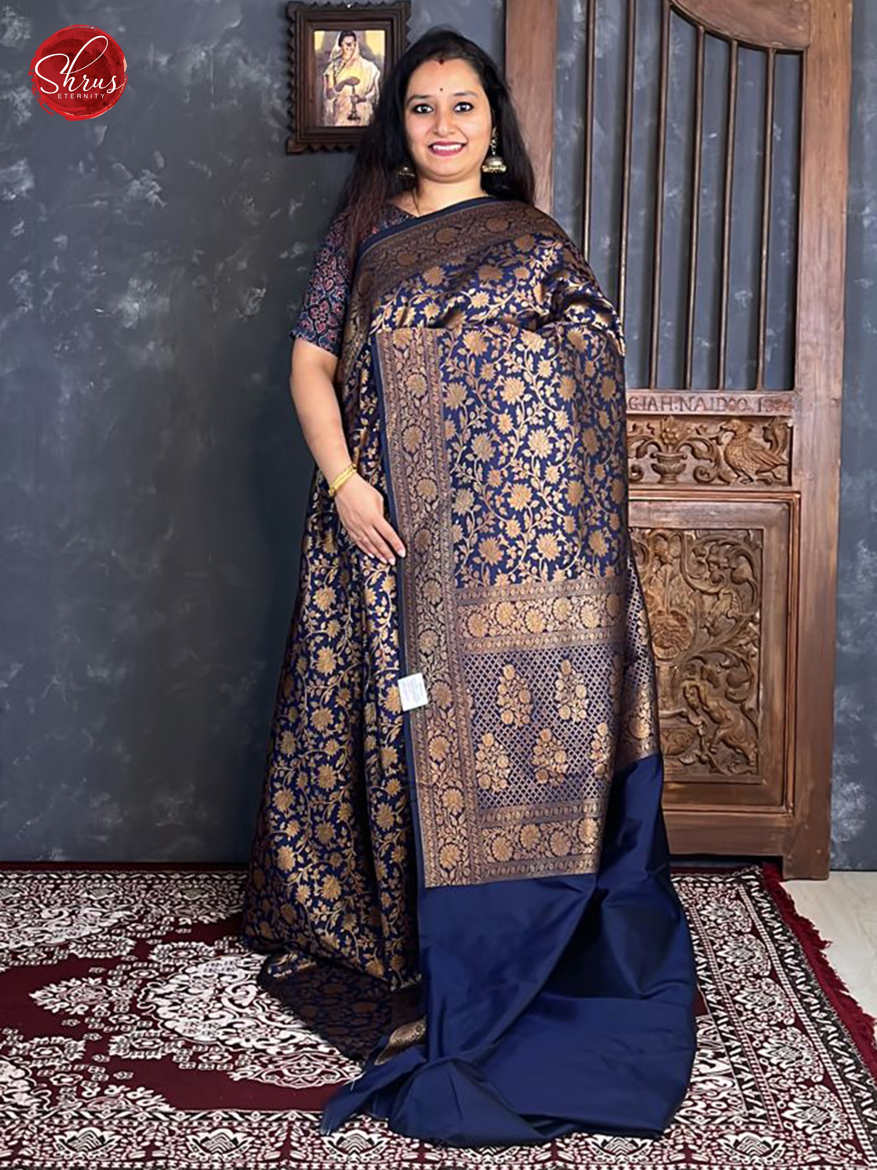 Blue(Single Tone)- Semi Banarasi with zari woven floral nestling brocade on the body & Zari Border - Shop on ShrusEternity.com