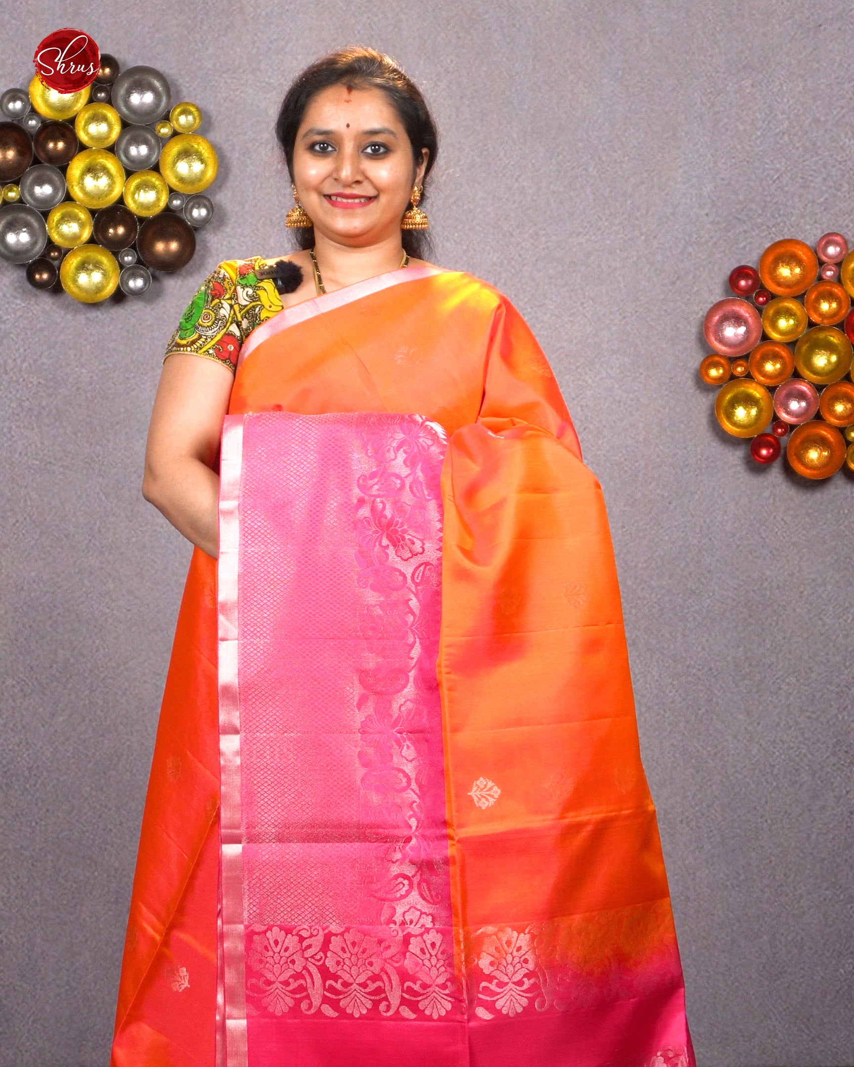 Bright Orange Soft Silk Saree With Floral Motifs & Pink Broad Border With Zari Floral Vines