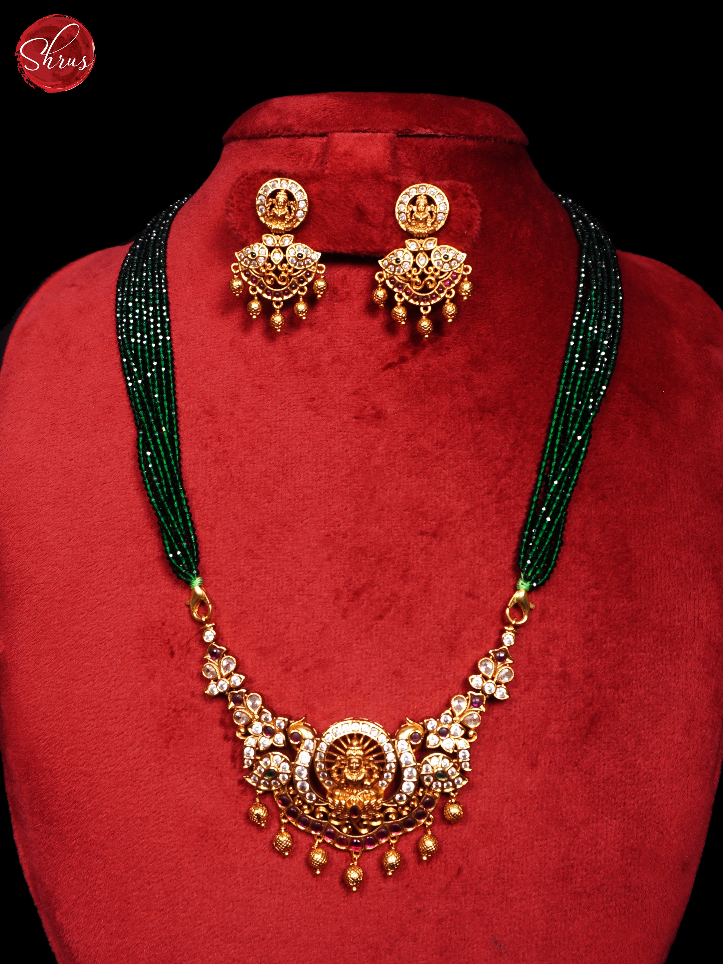 Gold Plated Lakshmi Pendant with Gren Crystal Mala- NECK PIECE & EARRINGS - Shop on ShrusEternity.com