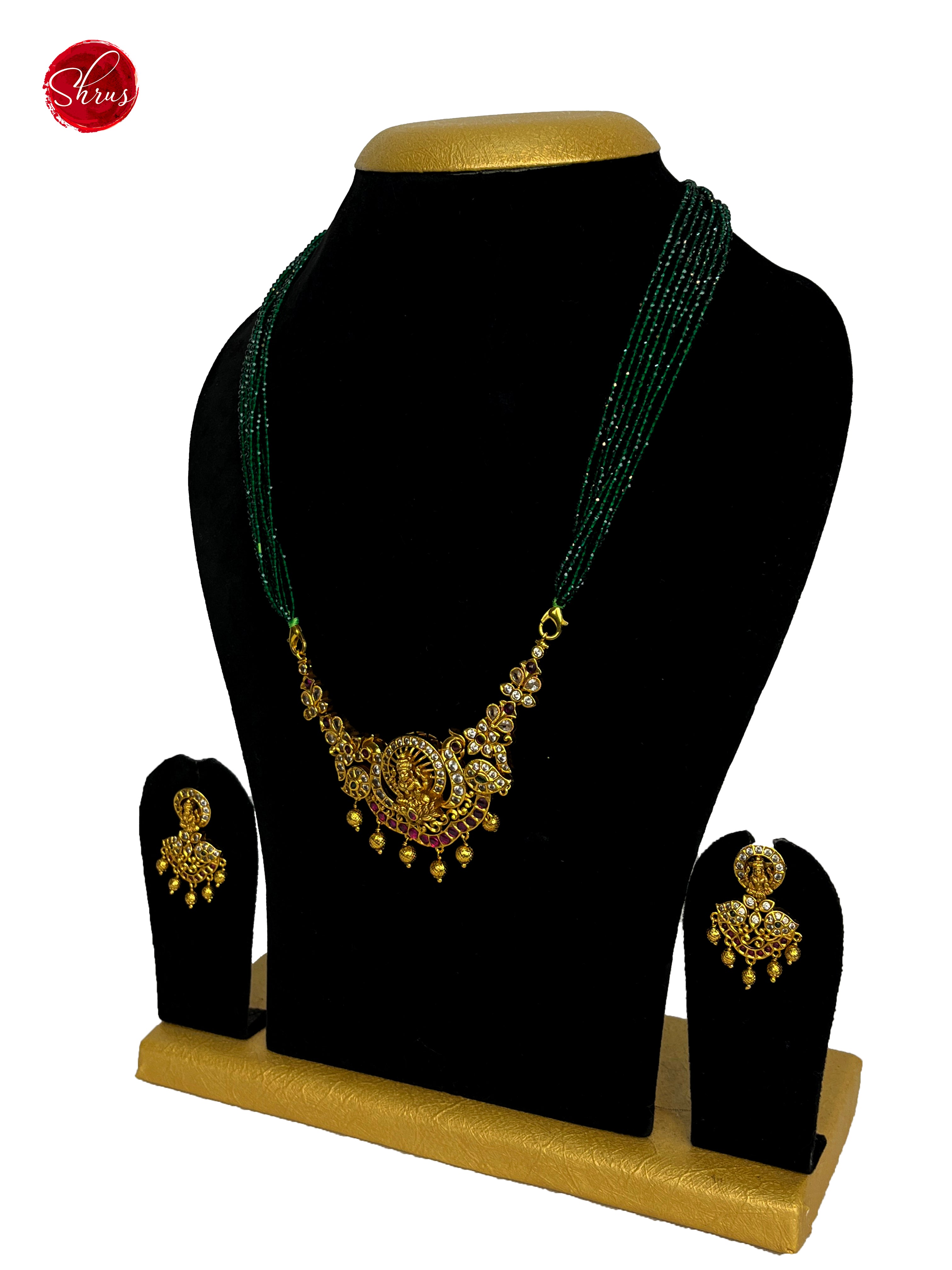 Gold Plated Lakshmi Pendant with Gren Crystal Mala- NECK PIECE & EARRINGS - Shop on ShrusEternity.com