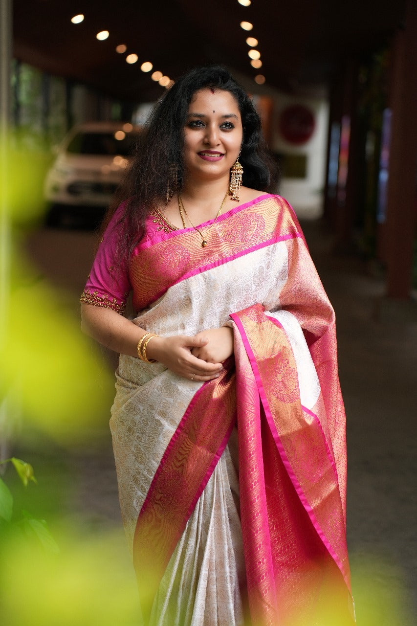 Cream & Pink- Semi Kanchipuram Saree with checkered Rudraksha & Peacock body patterns & with Gold zari borders - Shop on ShrusEternity.com