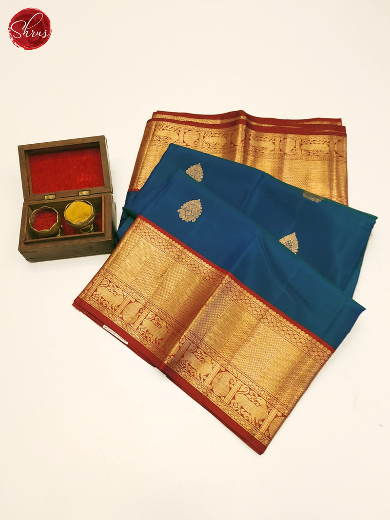 Blue & Red -  Kanchipuram Silk with zari woven floral buttas  on the body & Contrast zari Border - Shop on ShrusEternity.com