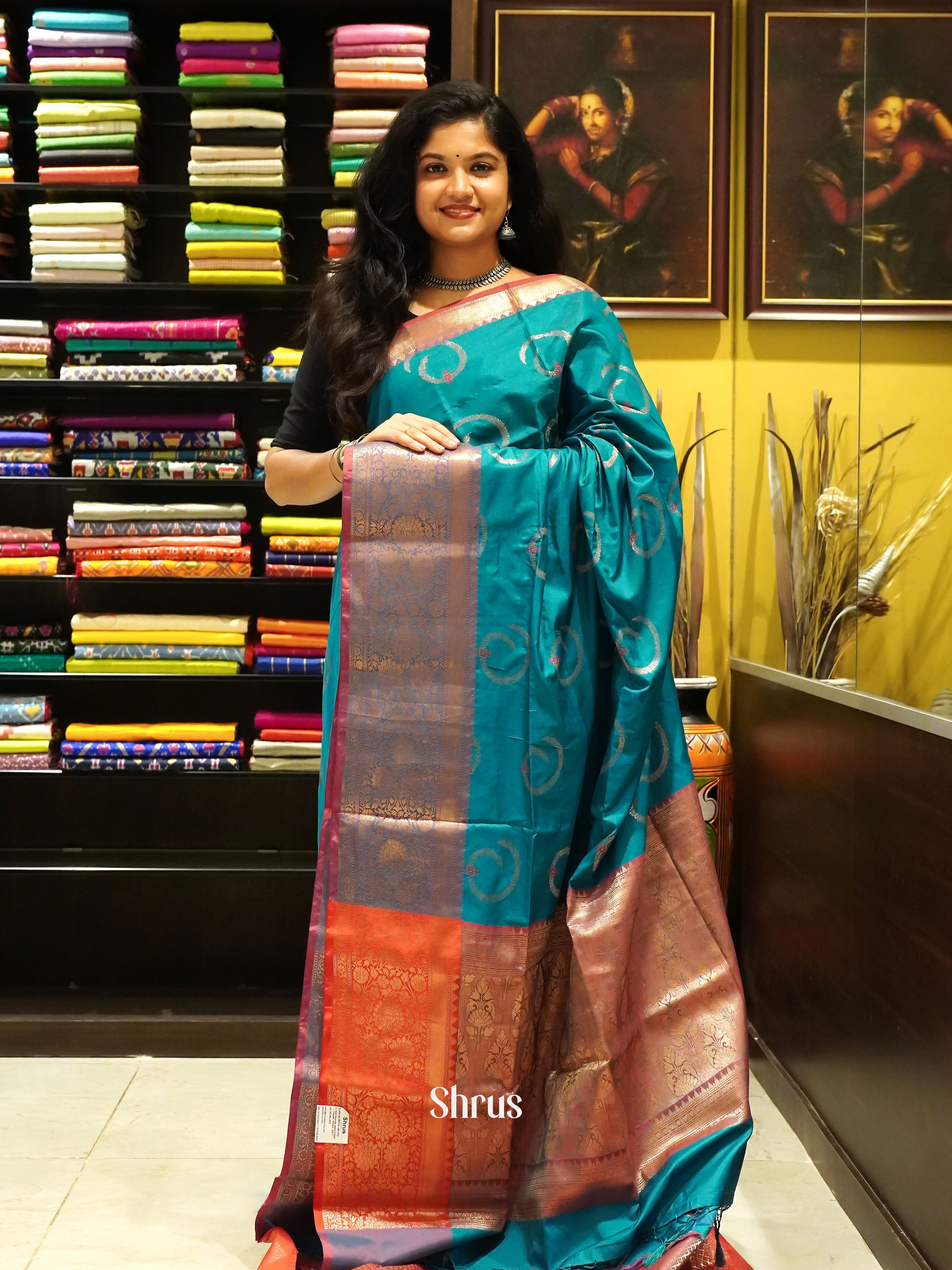 Peacock Green & Orange- Semi Soft Silk Saree