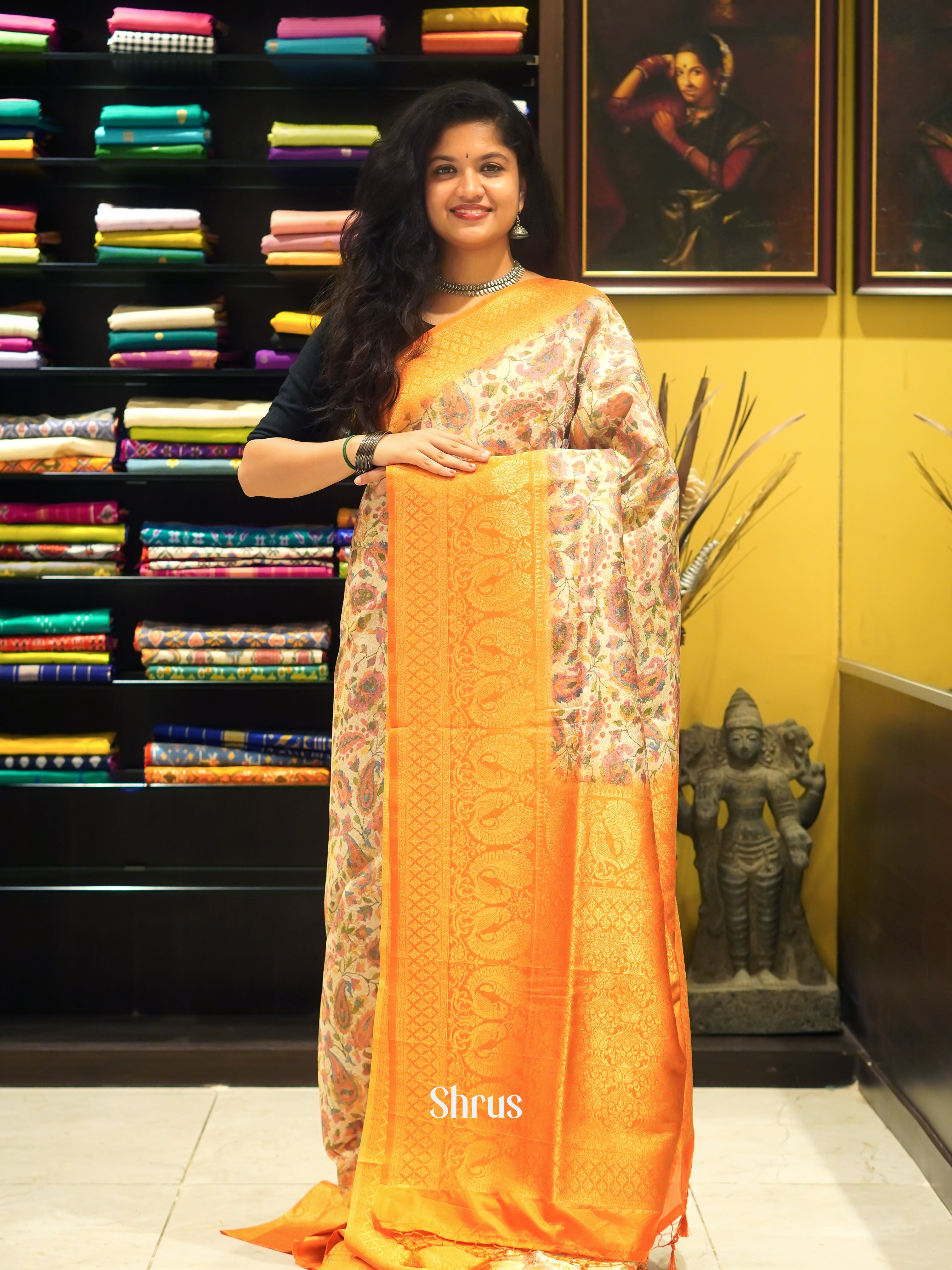 Cream & Orange - Semi Georgette with floral print on the body & Zari Border