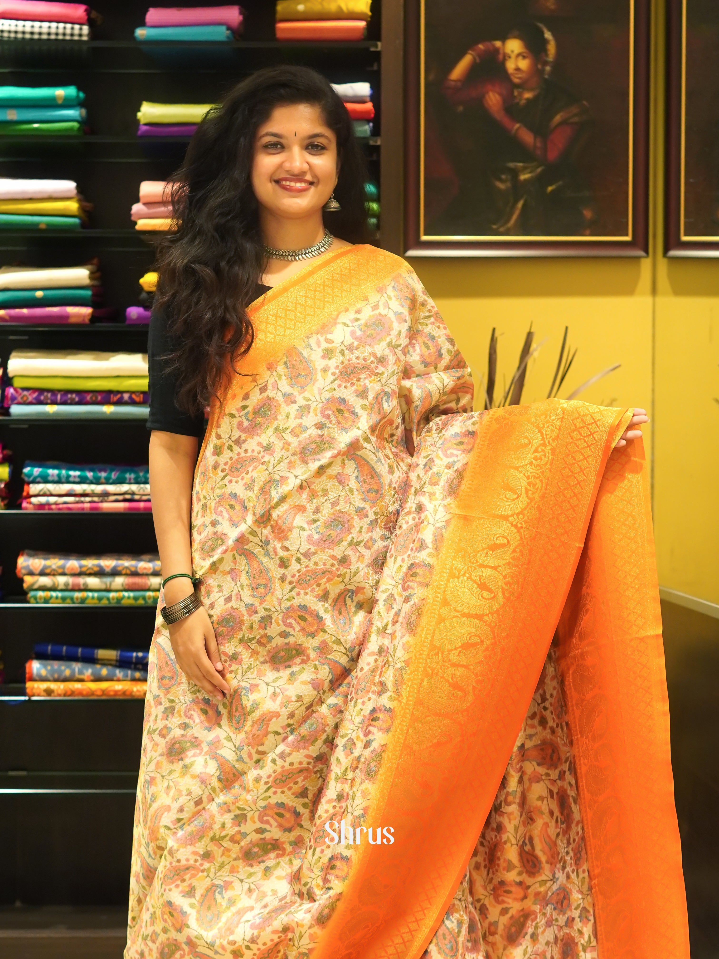 Cream & Orange - Semi Georgette with floral print on the body & Zari Border