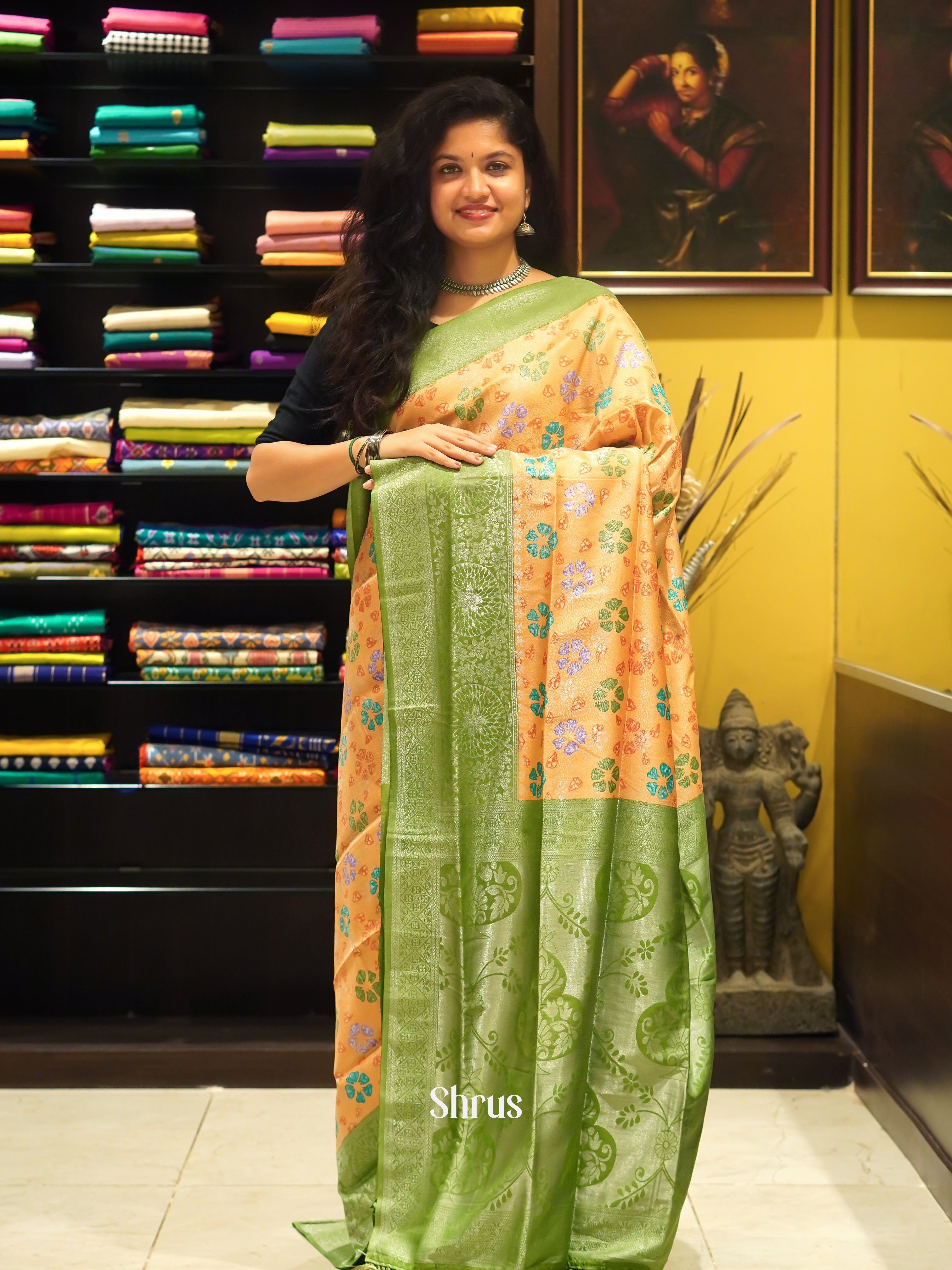 Orange & Green- Semi Georgette on the body & Contrast zari border