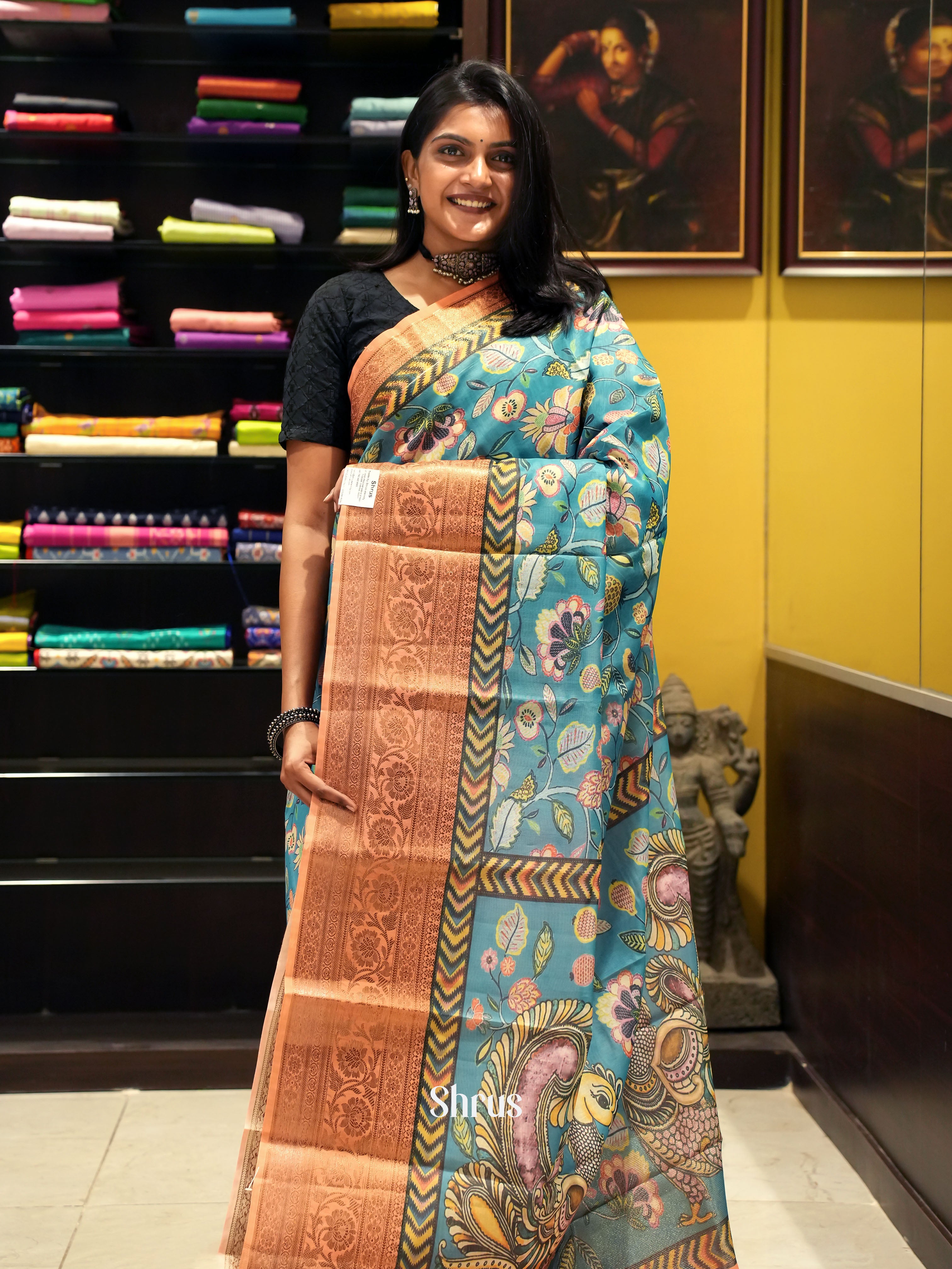 Blue & Peach - Semi Chanderi with floral print on the body & Zari Border