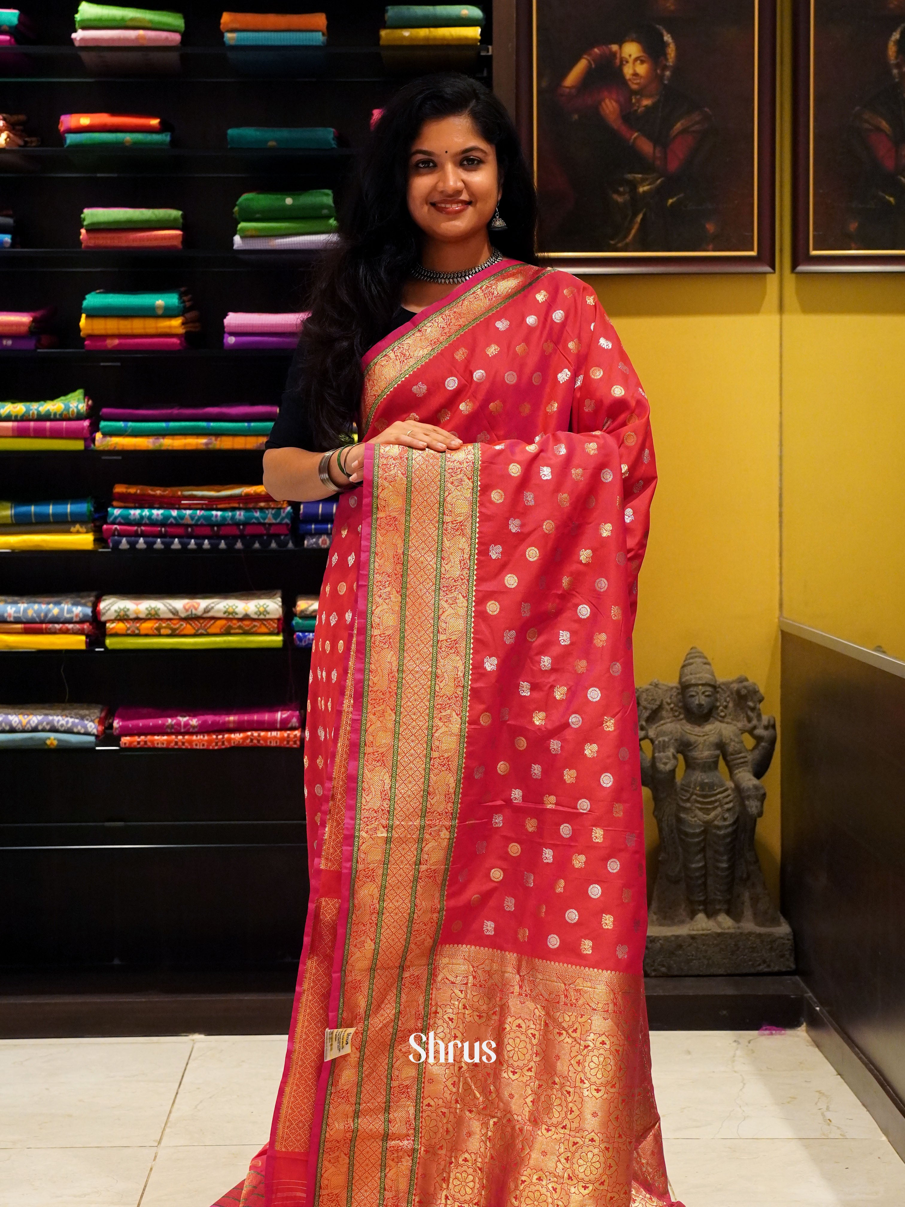 Pink(Single Tone)- Semi Kanchipuram with Zari woven  peacock , elephant , floral buttas   on the body &   Zari Border