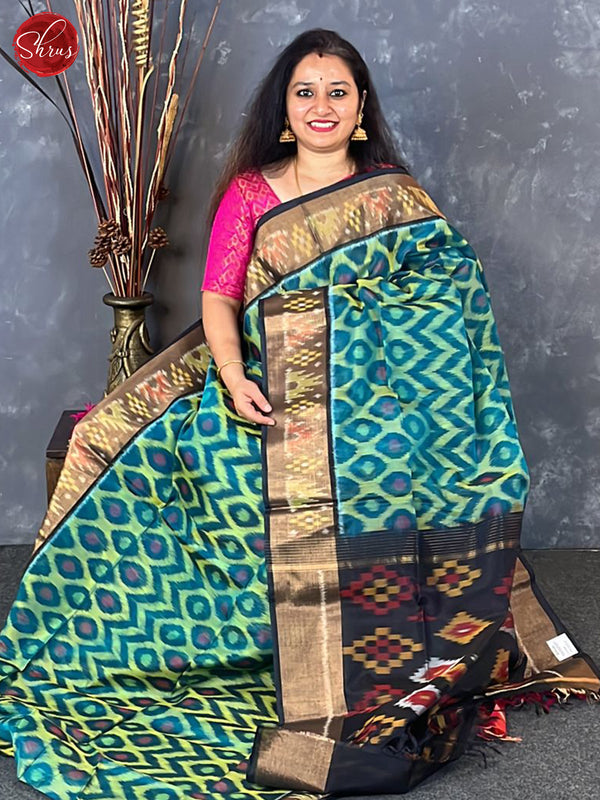 Tvis and Bliss. Yellow and Olive Green Pochampally Ikkat Silk Cotton Saree