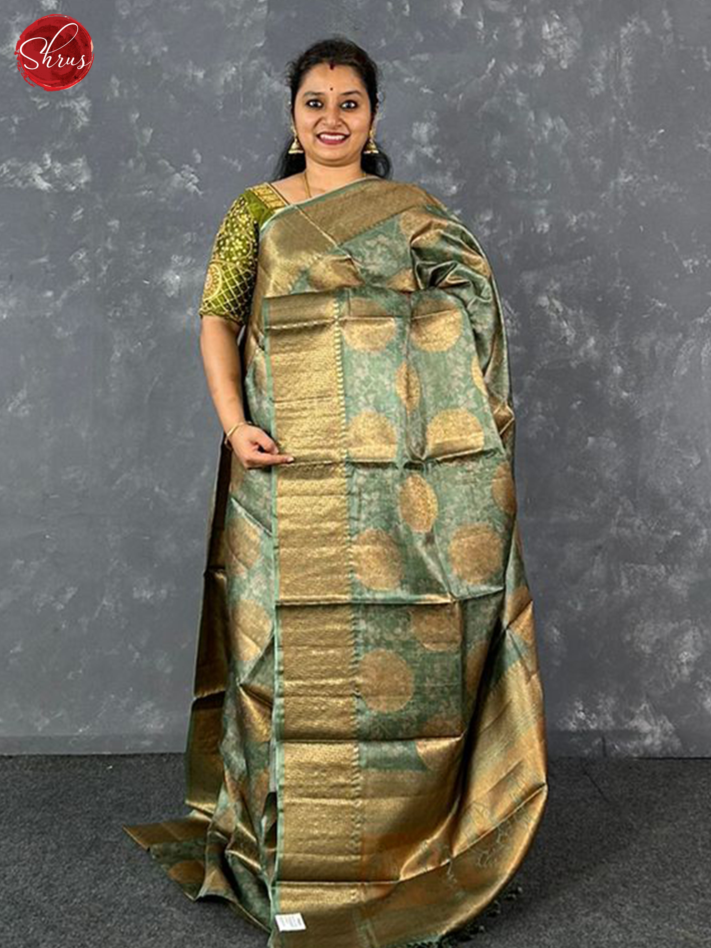 Green(Single Tone)-  Tussar with zari woven floral   motifs , floral print on the body & Zari Border - Shop on ShrusEternity.com