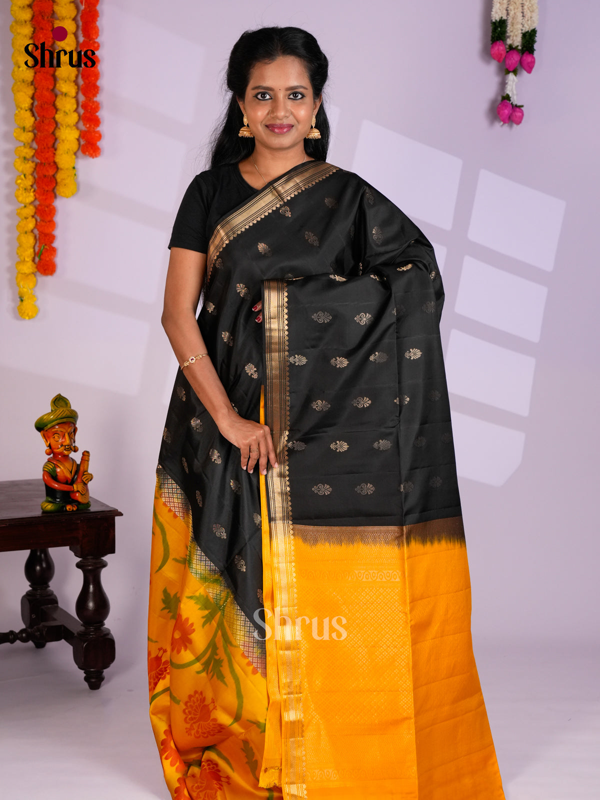 Buy Pretty Black Half & Half Soft Silk Saree with Floral Buttas & Yellow Ikkat Floral Nestling