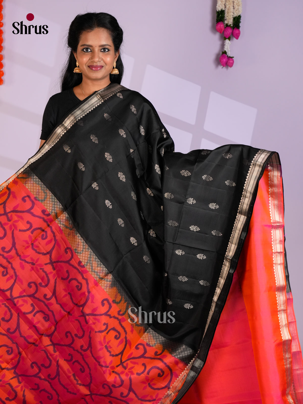 Buy Contemporary Black Pure Soft Silk Saree with Floral Buttas & Orange Ikkat Floral Nestling