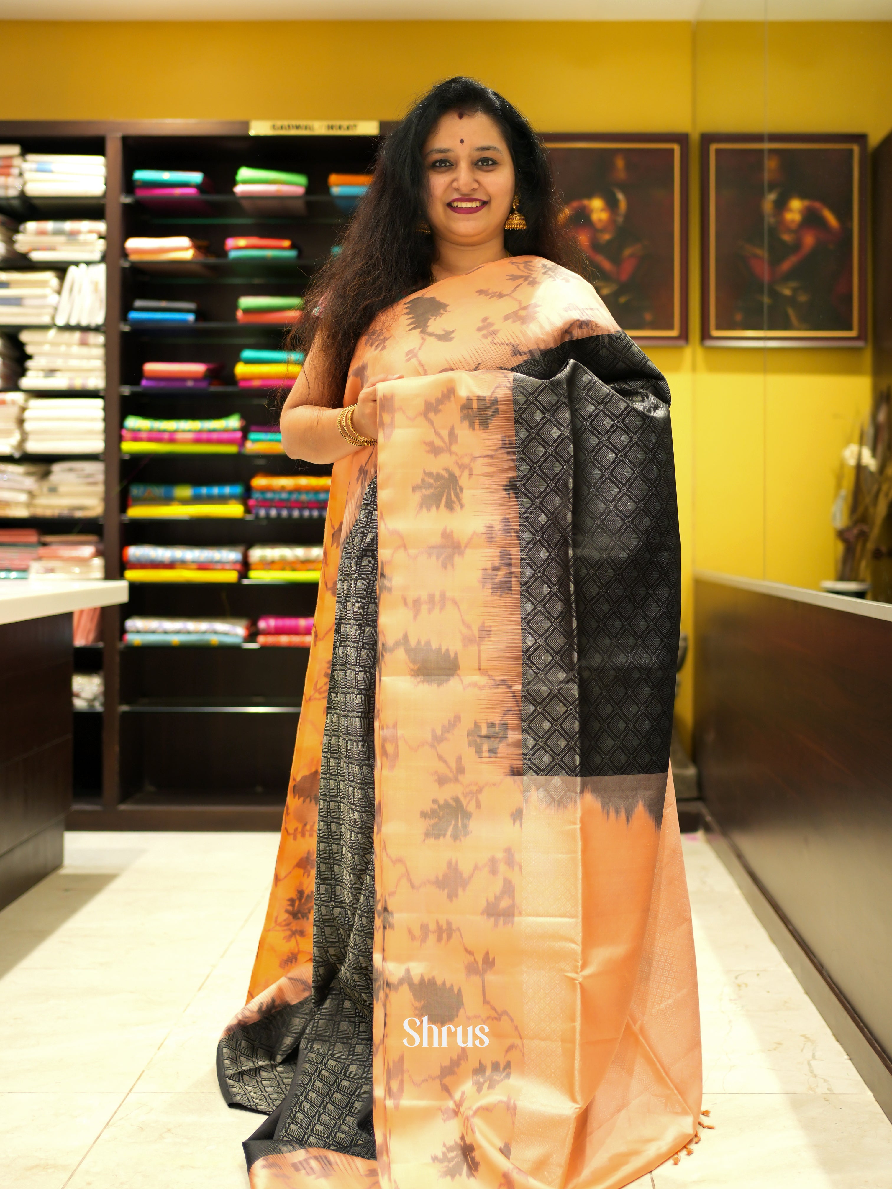 Captivating Black Soft Silk Saree With Zari Geometric Brocade & Peach Floral Border & Pallu