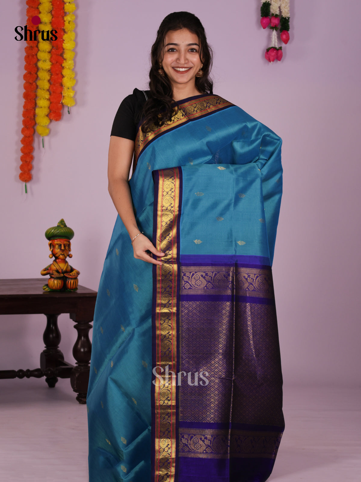 Buy Serene Blue Silk Cotton Saree with Golden Buttas & Zari Woven Purple Korvai Border