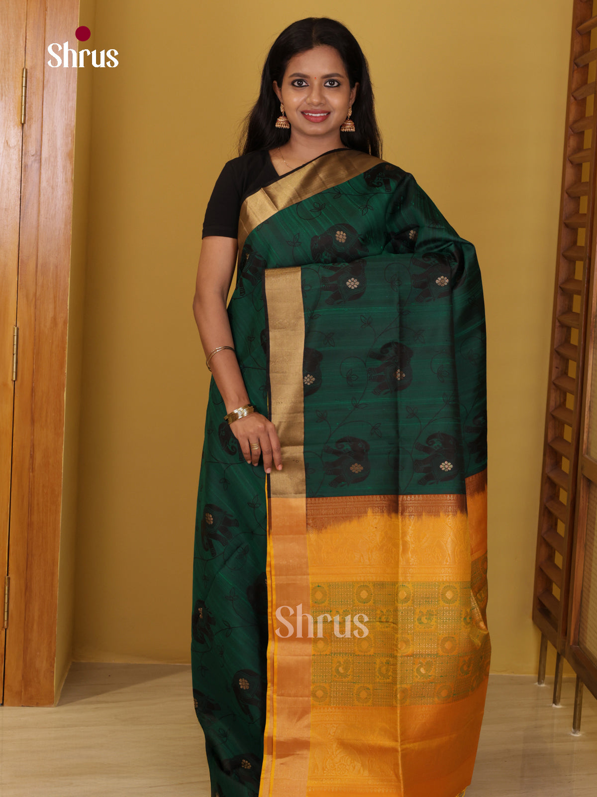 Buy Striking Bottle Green Soft Silk Saree With Elephant Motif Prints & Mustard Brocade Pallu