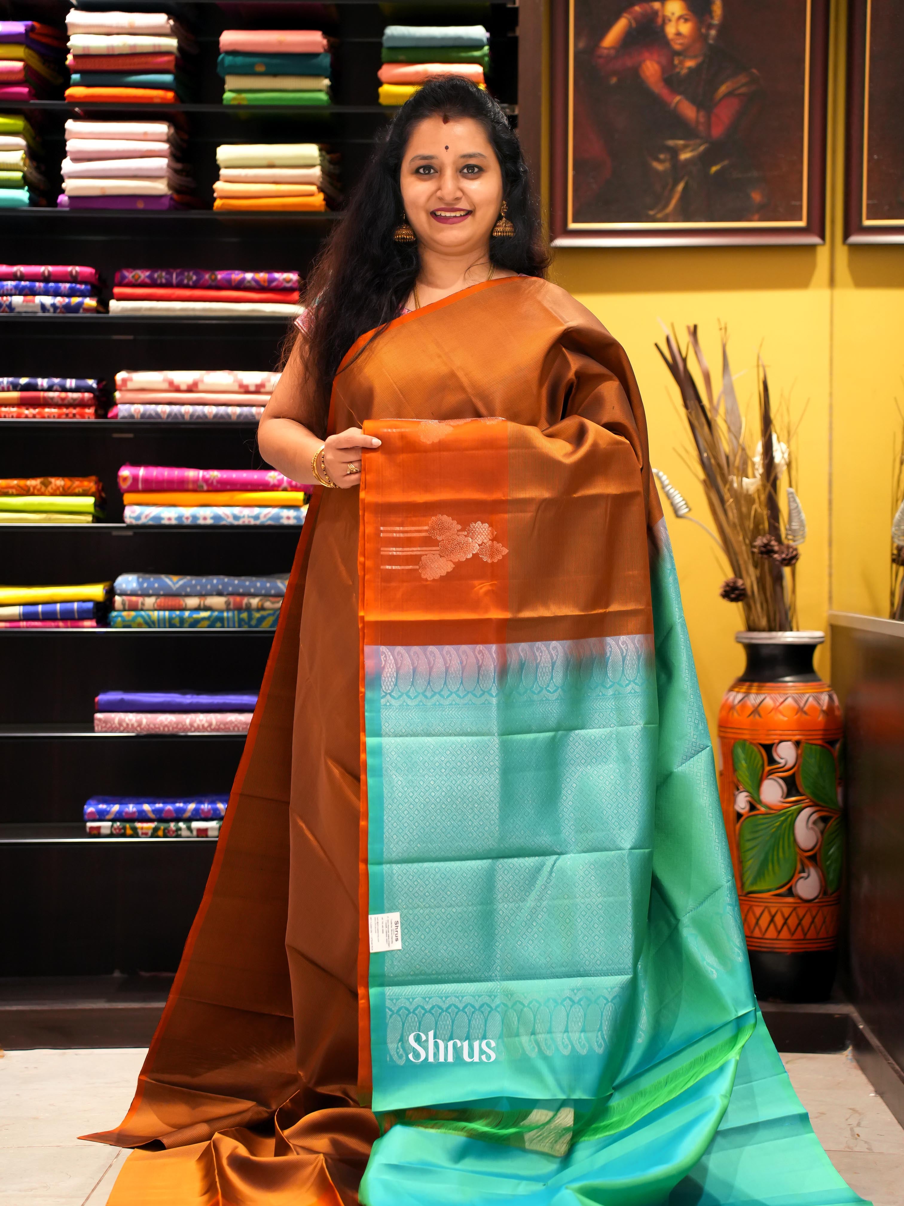 Breathtaking Bronze Soft Silk Saree With Zari Tree Clusters & Sea Green Brocade Pallu