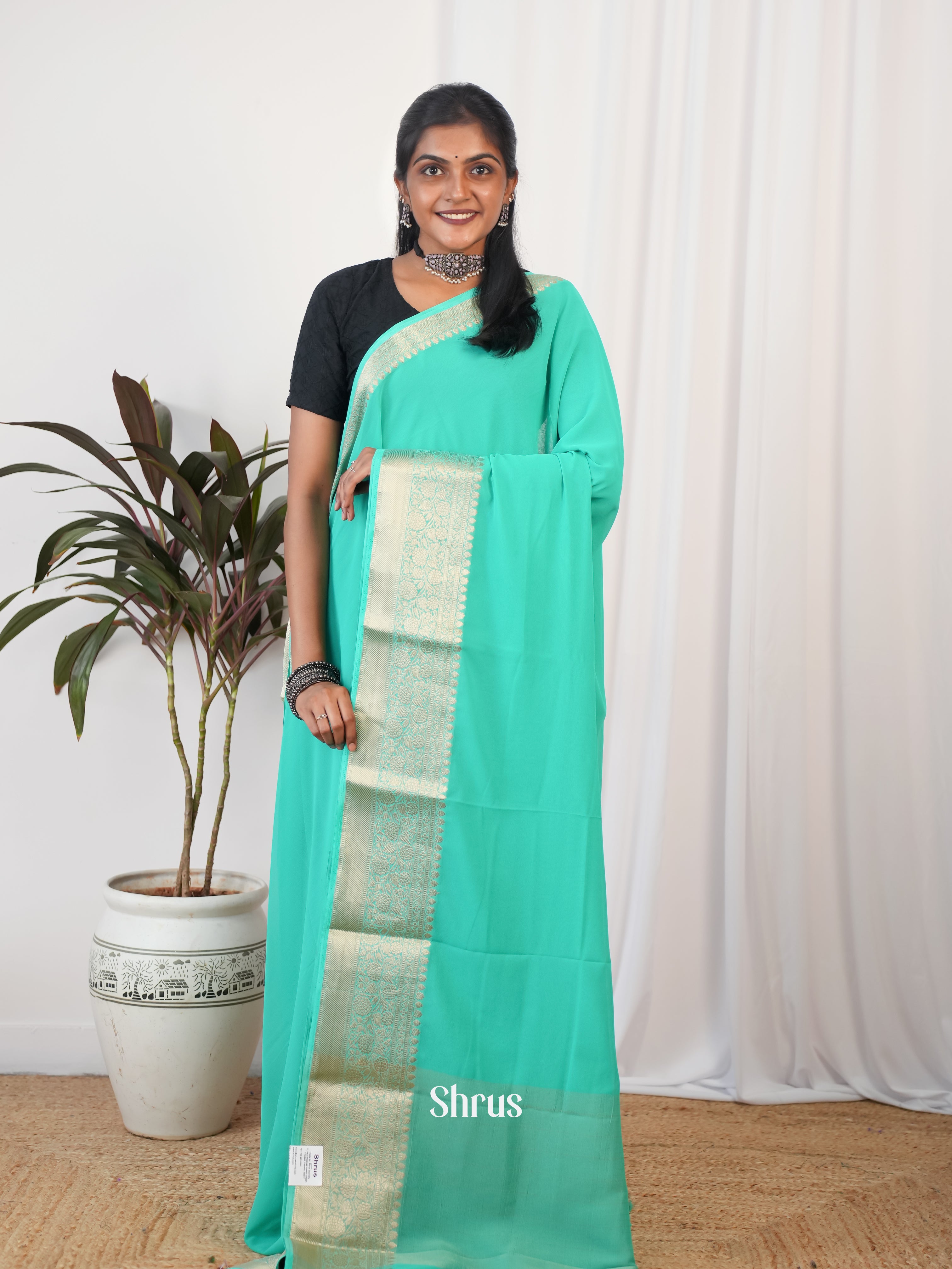 Teal - Semi Georgette Saree