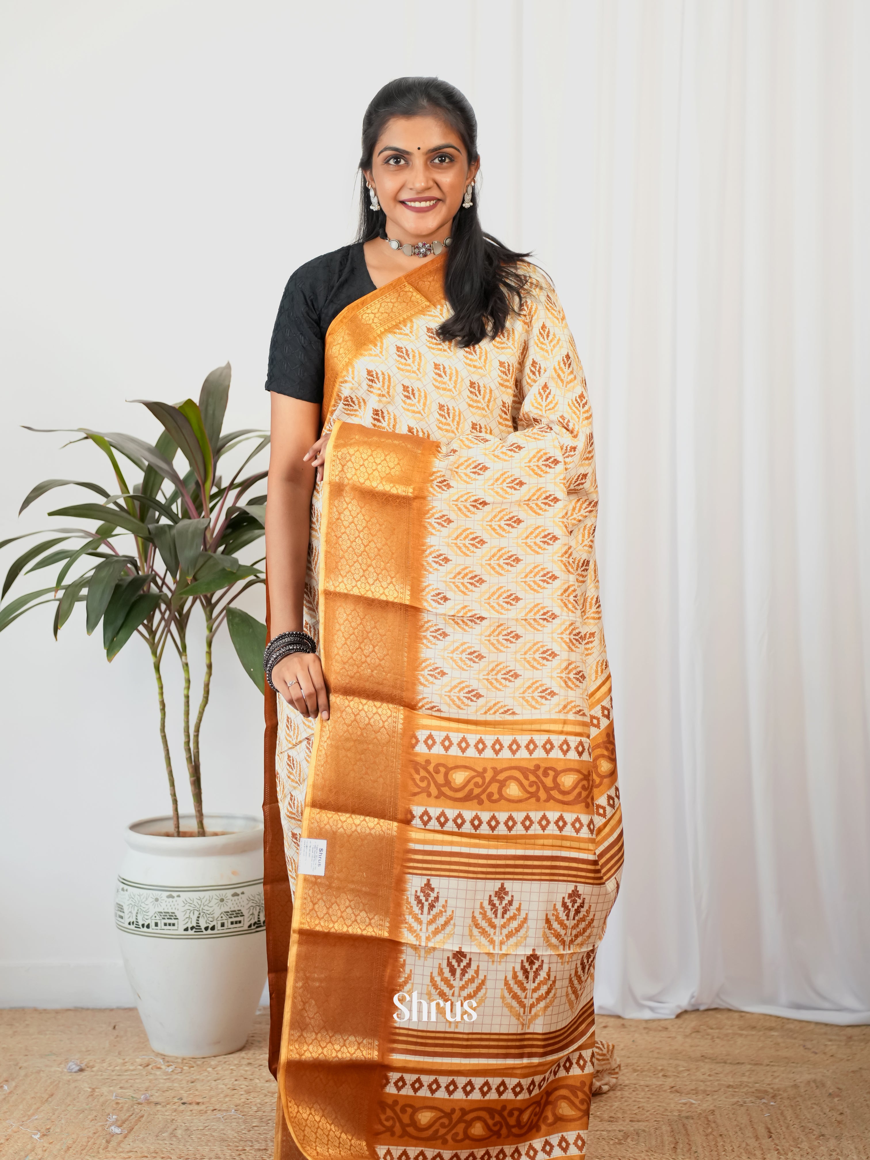 Cream & Brown   - Semi Crepe Saree