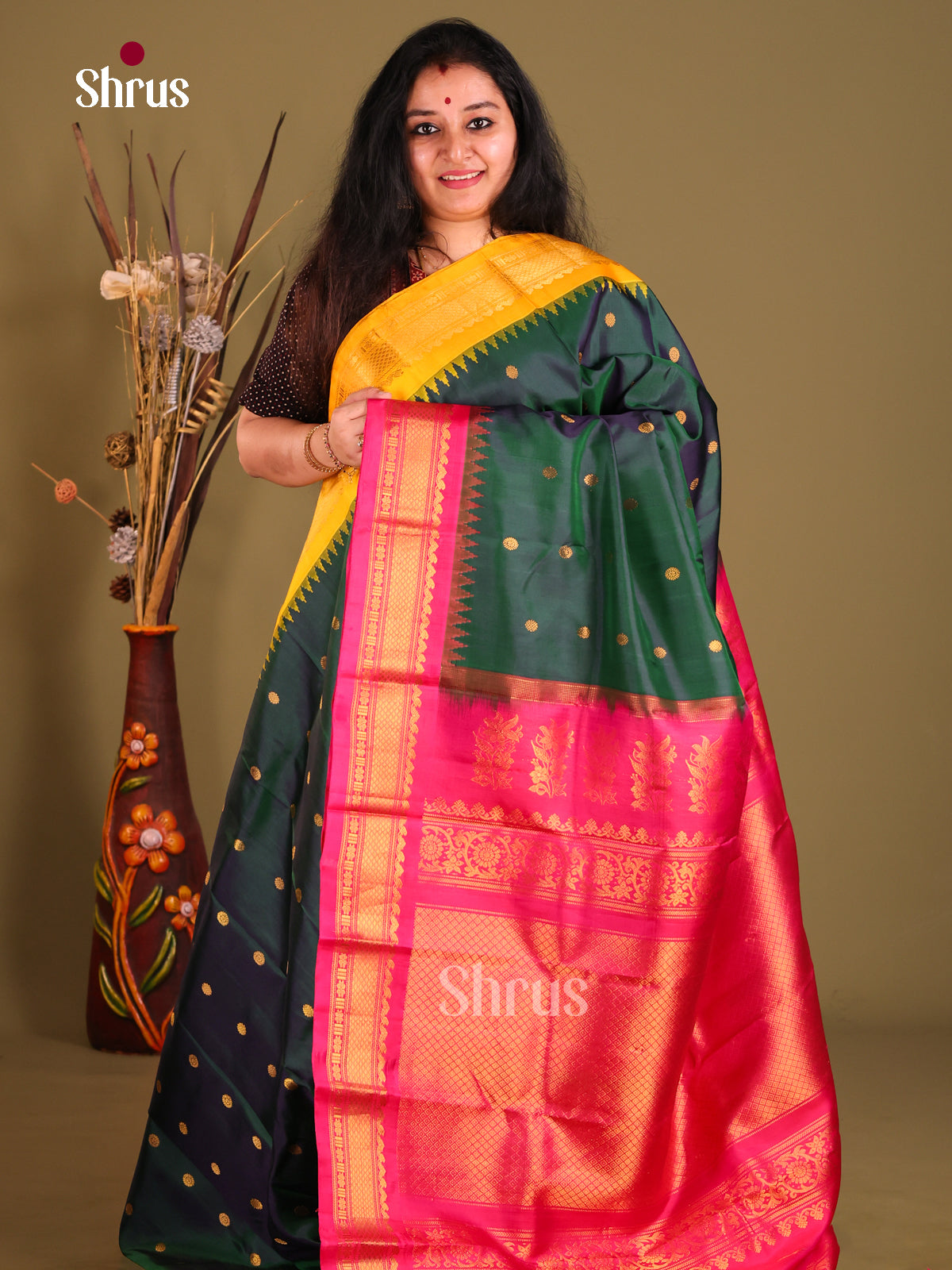 Serene Green Gadwal Silk Saree with Pink Zari Pallu