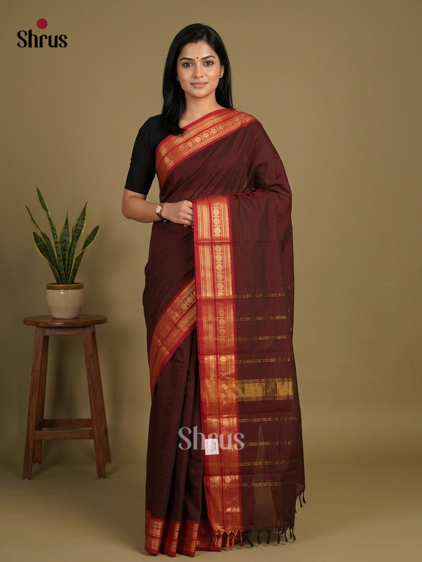 Charming Dark Maroon Chettinad Cotton Saree With Plain Body & Red Border With Zari Stripes