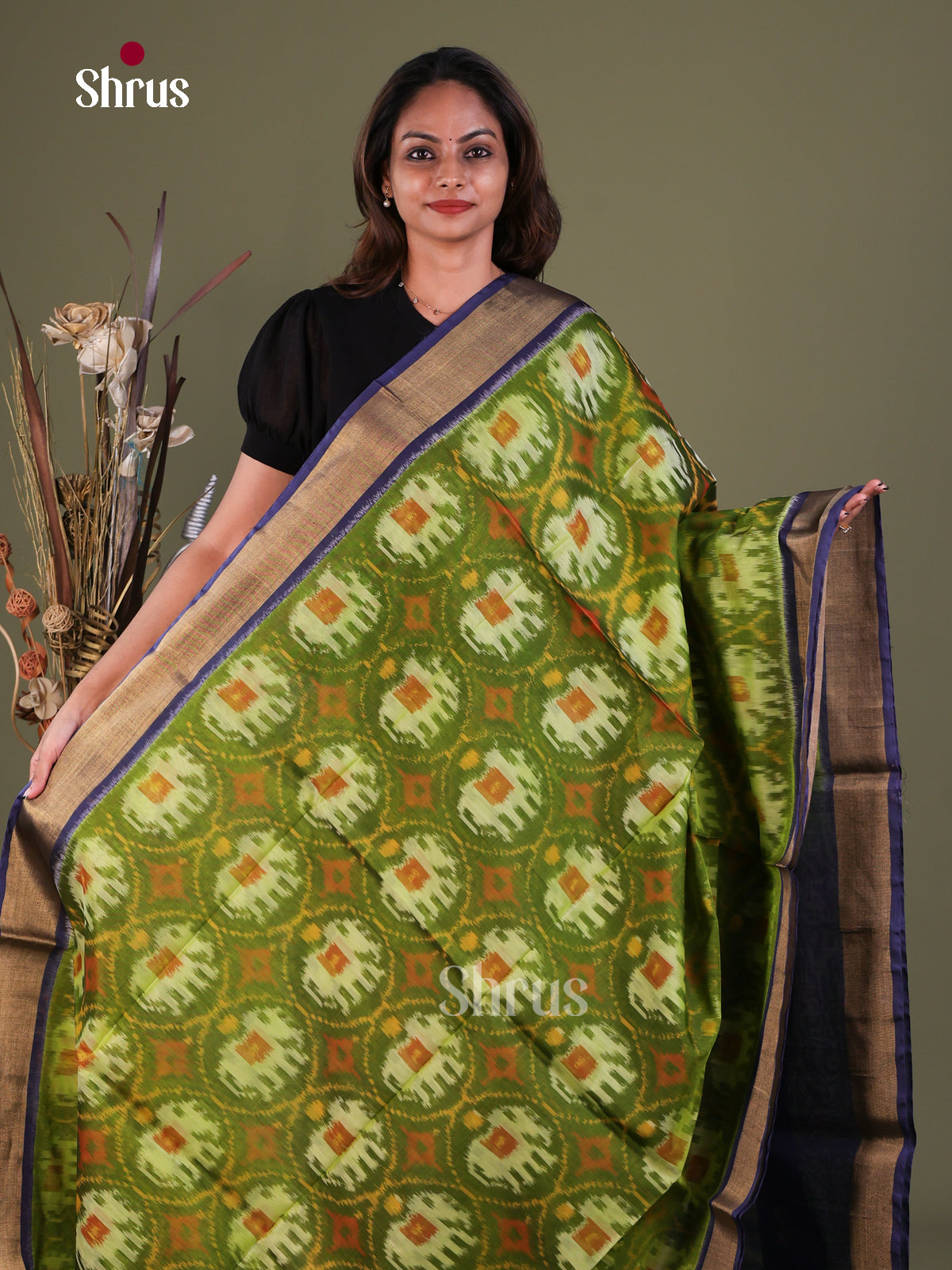 Charming Olive Green Pochampally Cotton Silk Saree With Elephant Prints & Indigo Kaddi Border