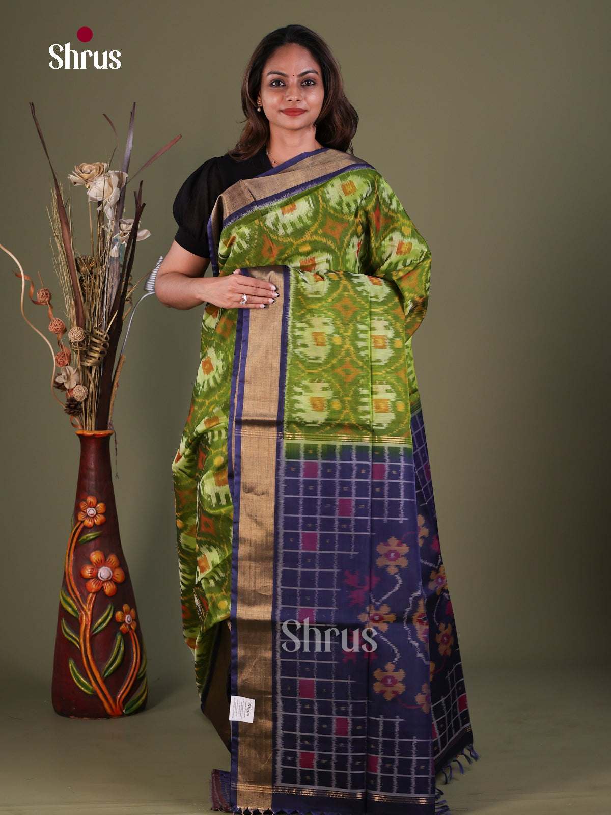 Charming Olive Green Pochampally Silk Cotton Saree With Elephant Prints & Indigo Kaddi Border