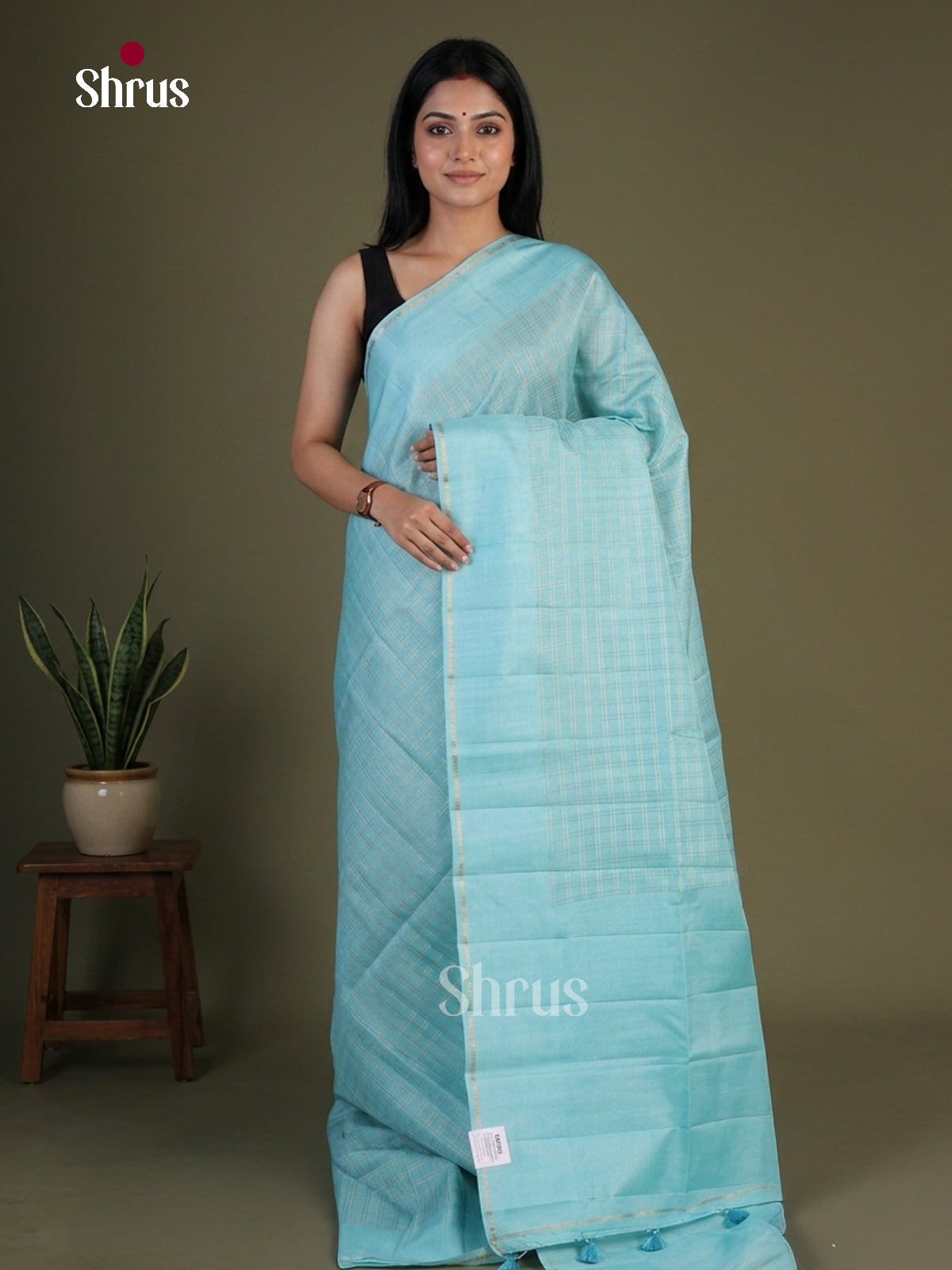 Charming Sky Blue Semi Raw Silk Saree With Silver Zari Checks, Plain Border & Pallu