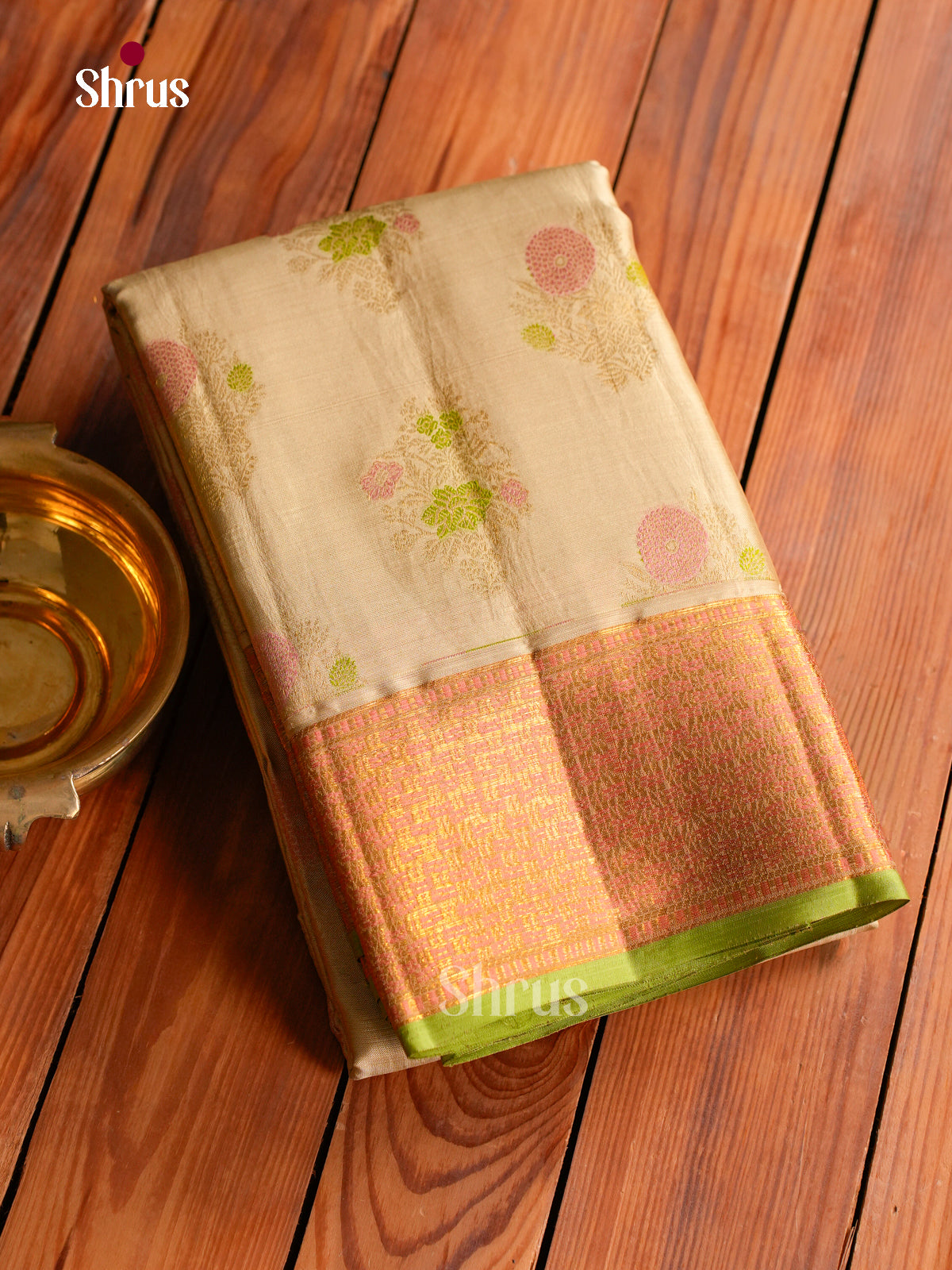 Classy Cream Kanchipuram Silk Saree With Pink & Green Floral Buttas | Peach Border & Pallu With Geometric Brocade