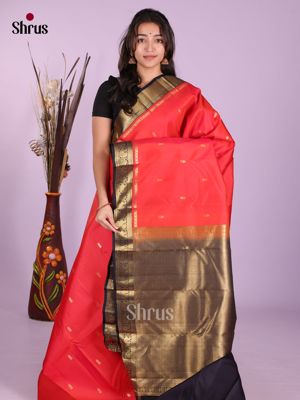 Buy Ravishing Coral Red Kanchipuram Silk Saree With Zari Buttas, Black Border & Brocade Pallu