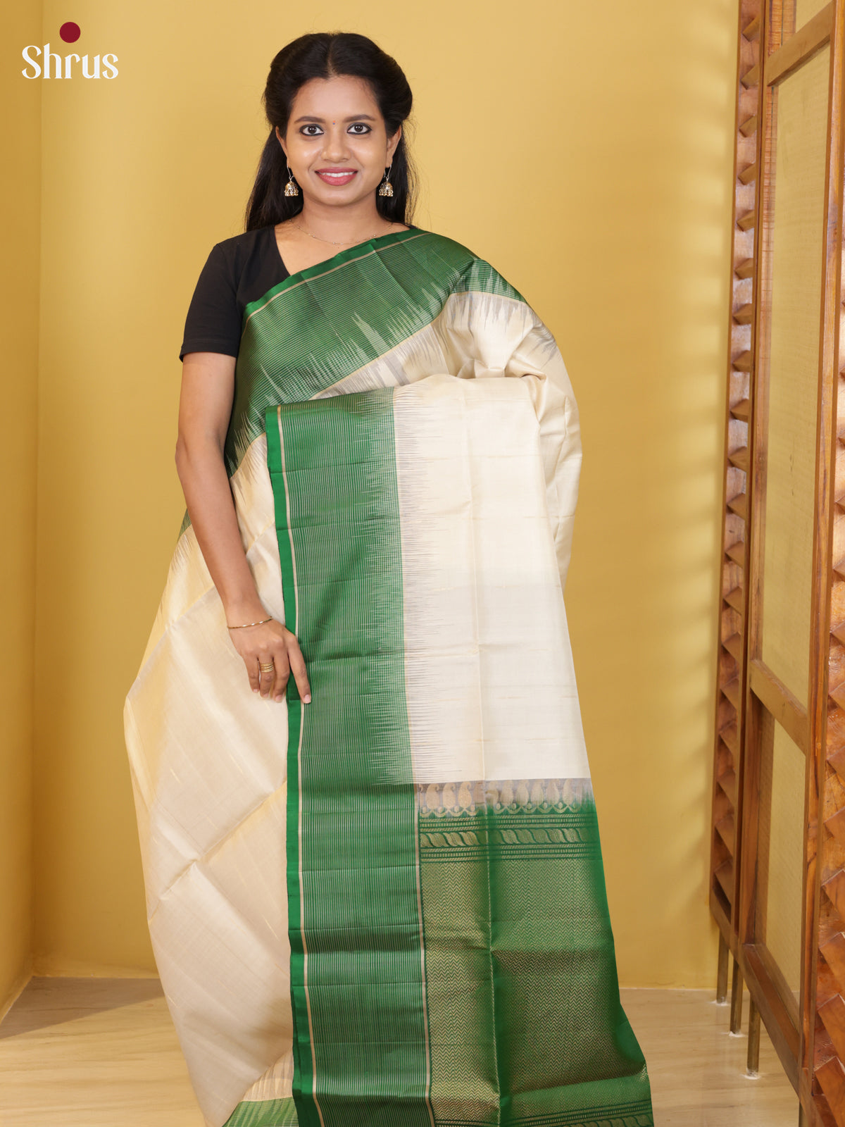 Buy Effulgent Cream Soft Silk Saree with Stripes Buttas, Green Border & Brocade Pallu