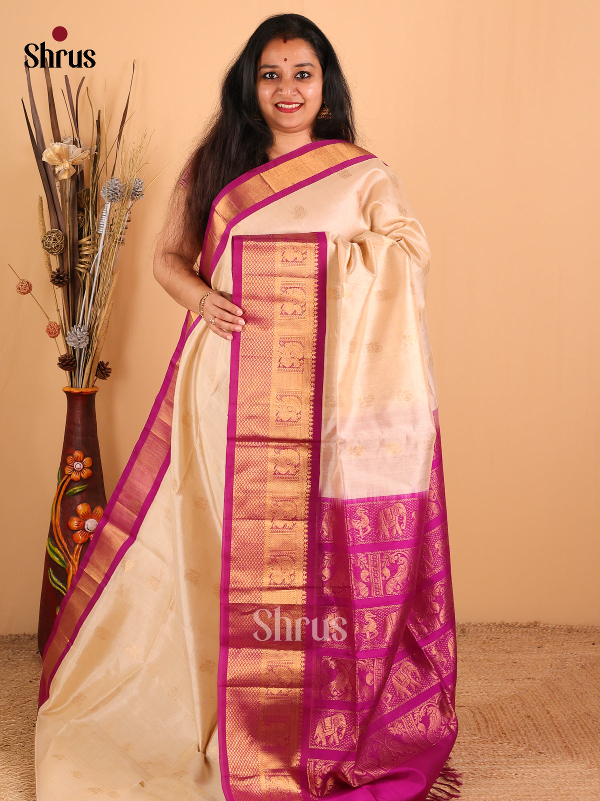 Enchanting Sandal And Purple Silk Cotton Saree With Zari Woven Peacock Buttas - Shop on Shrus.com