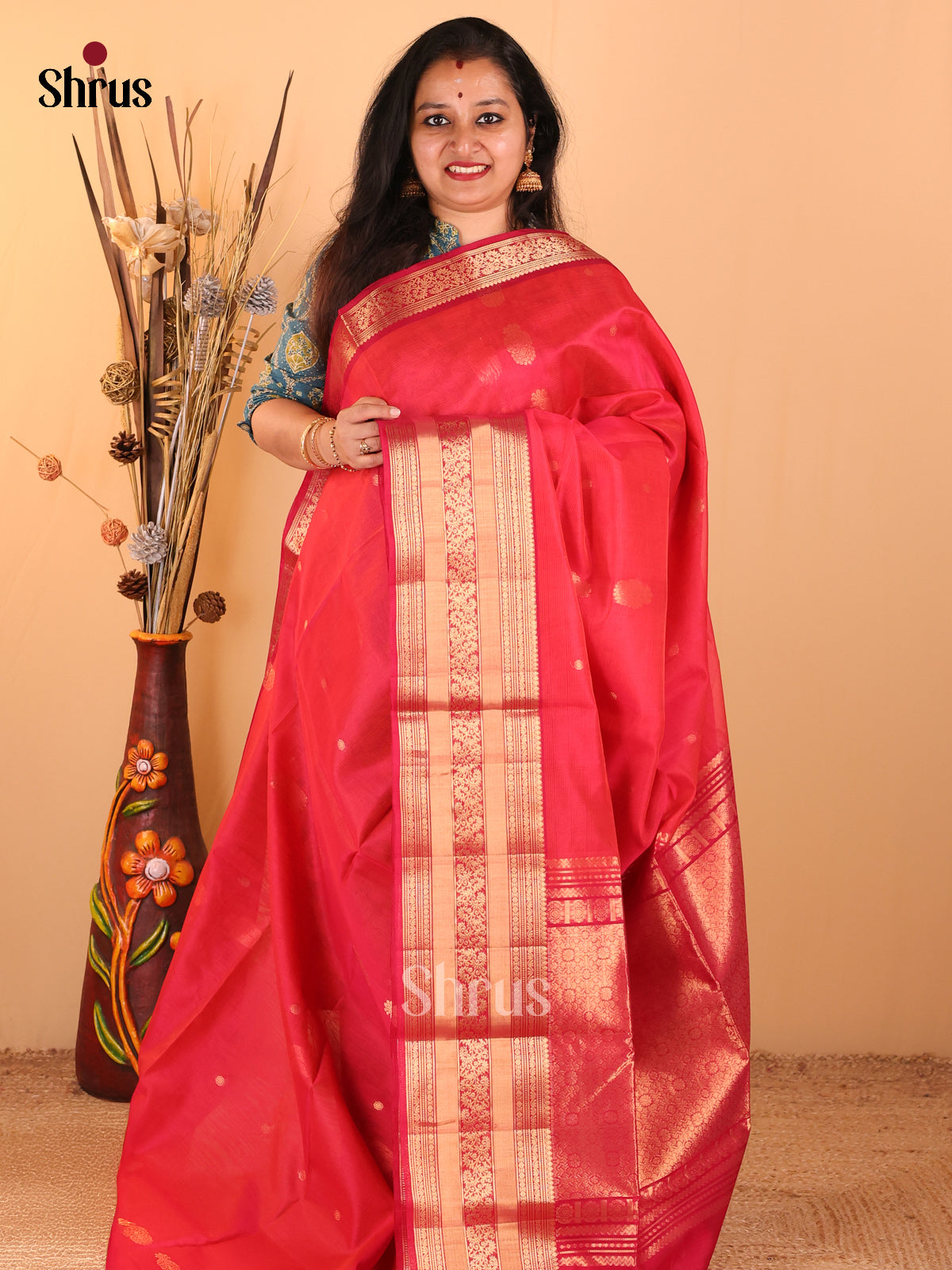 Red Silk Cotton Saree With Floral Zari Buttas Across The Body And Zari Woven Rettapet Border - Shop on Shrus.com