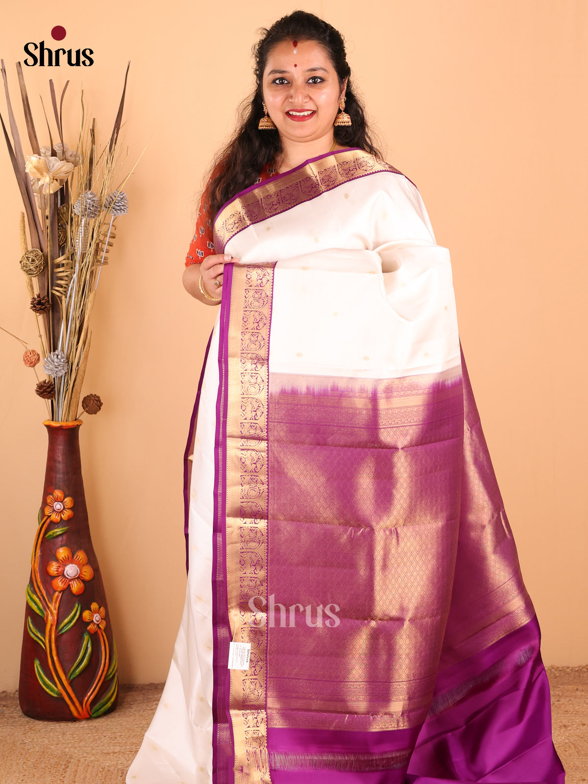 Charming Cream Kanchipuram silk Saree with gold zari floral buttas , floral vines border - Shop on Shrus.com