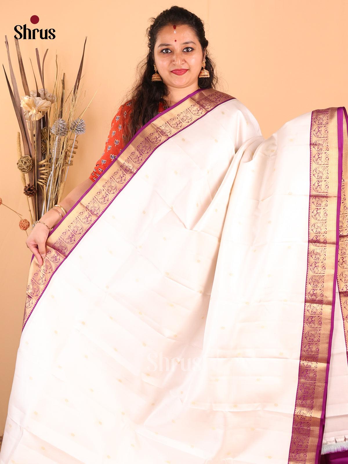 Charming Cream Kanchipuram silk Saree with gold zari floral buttas , floral vines border - Shop on Shrus.com