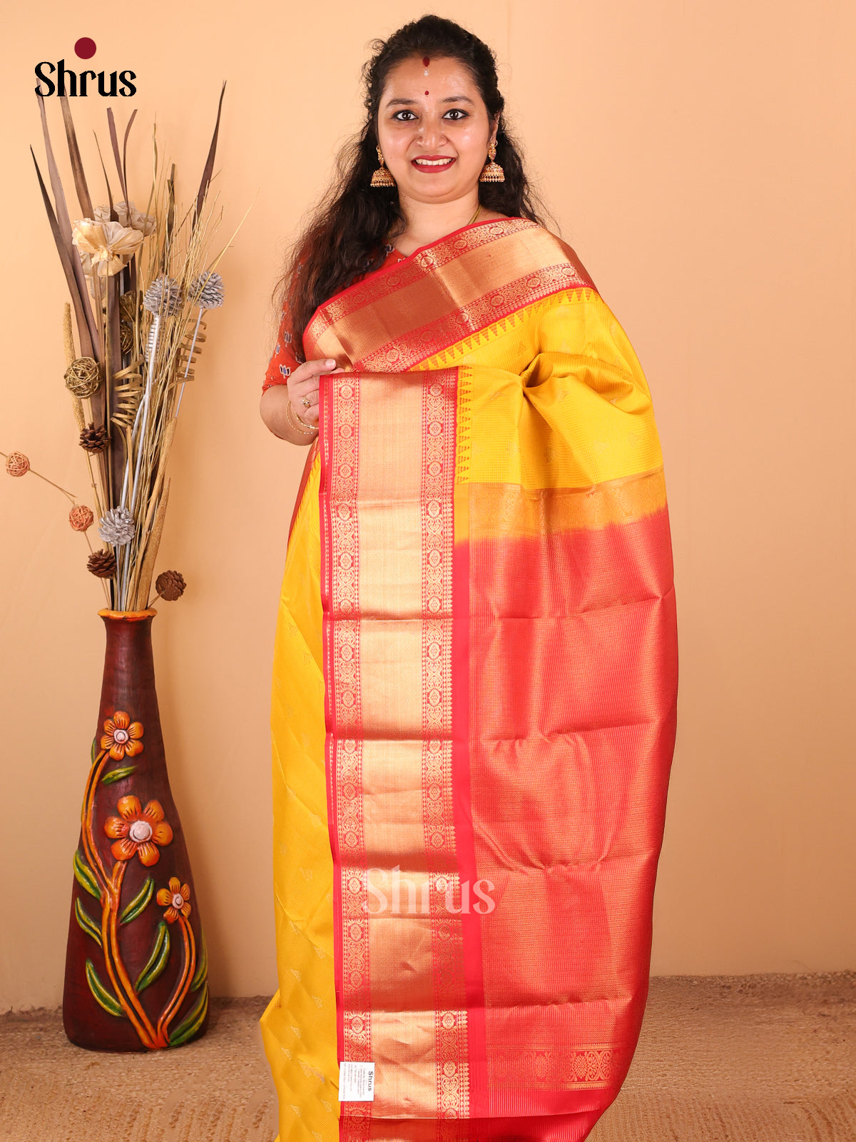Lustrous Yellow Kanchipuram silk Saree golden buttas & floral vine border - Shop on Shrus.com
