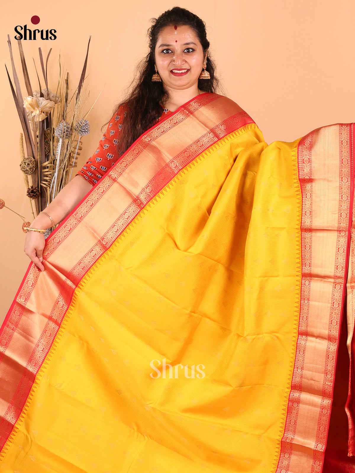 Lustrous Yellow Kanchipuram silk Saree golden buttas & floral vine border - Shop on Shrus.com