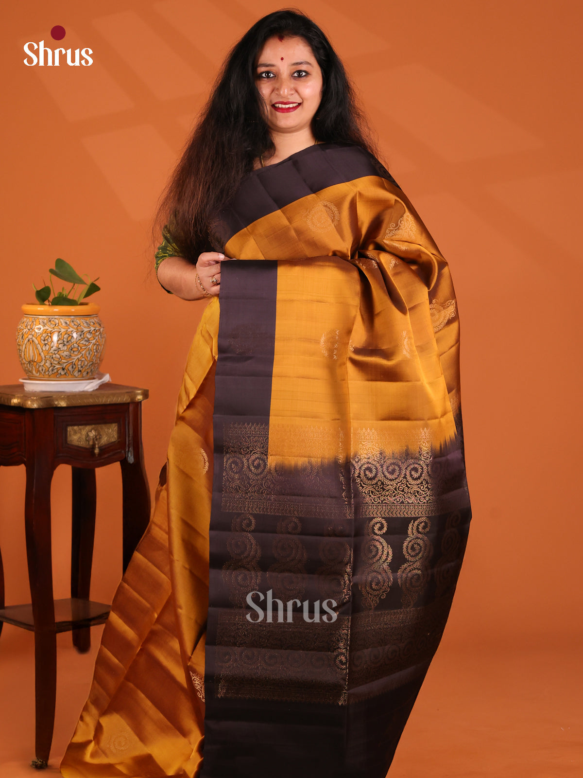 Lustrous Mustard Softsilk-halfpure Saree with gold zari floral motifs , contrast border - Shop on Shrus.com