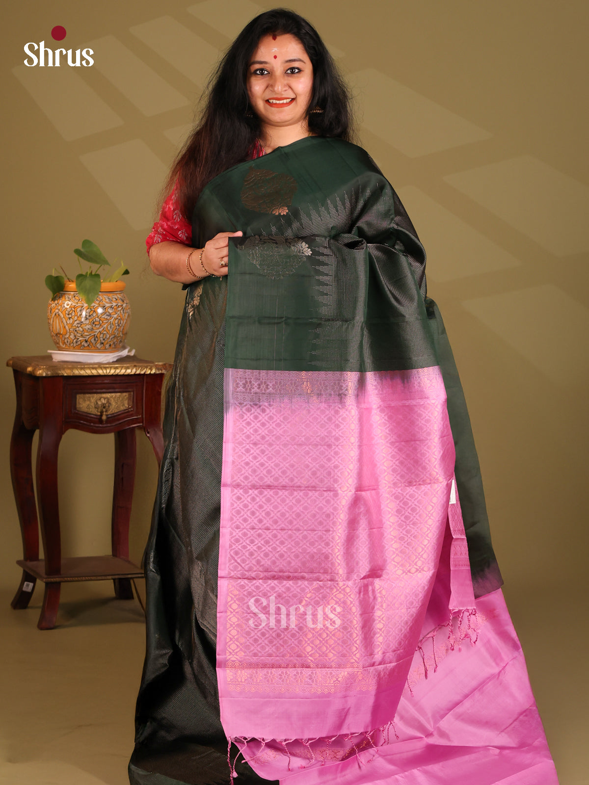 Graceful Dark Green Soft Silk Saree with zari woven brocade ,Pink criss cross brocade pallu - Shop on Shrus.com
