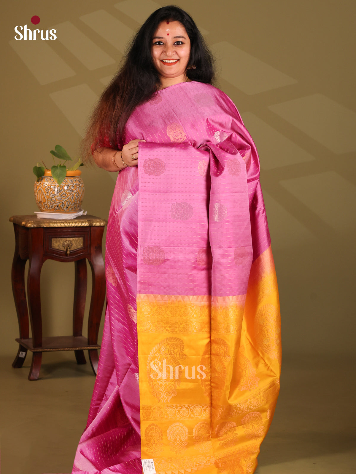Lustrous Pink Borderless Soft Silk Saree with gold zari buttas , stripes , paisley pallu - Shop on Shrus.com