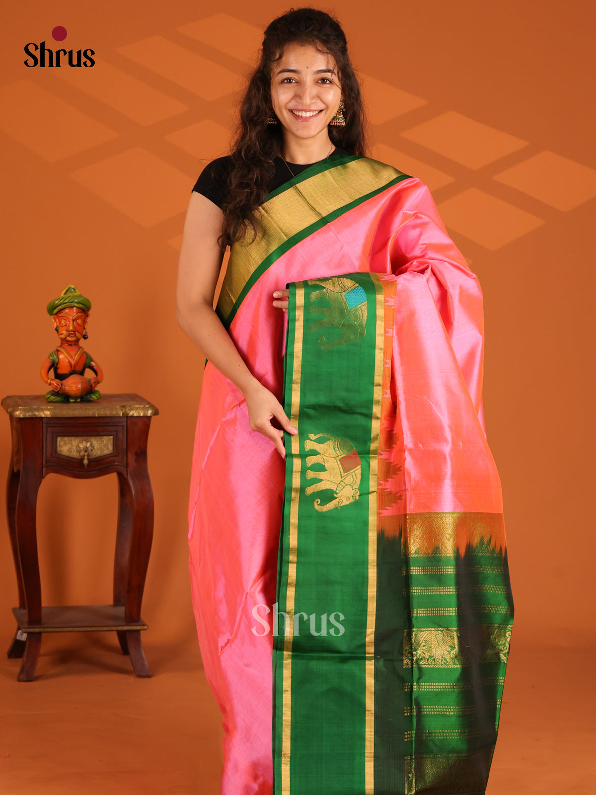 Elegant Pink Silk Cotton Saree with simple body , elephant motifs border - Shop on Shrus.com