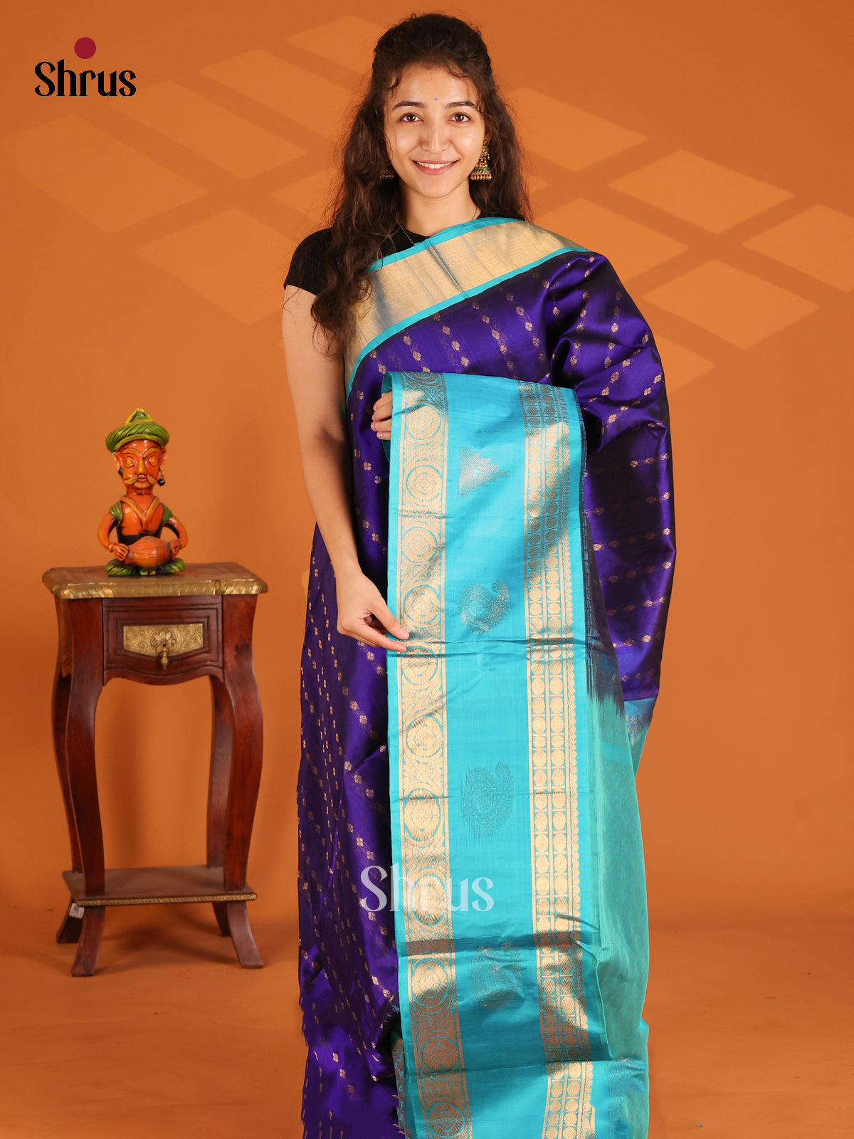 Vibrant Blue Silk Cotton Saree gleams with gold zari buttas & contrast teal brocade pallu - Shop on Shrus.com