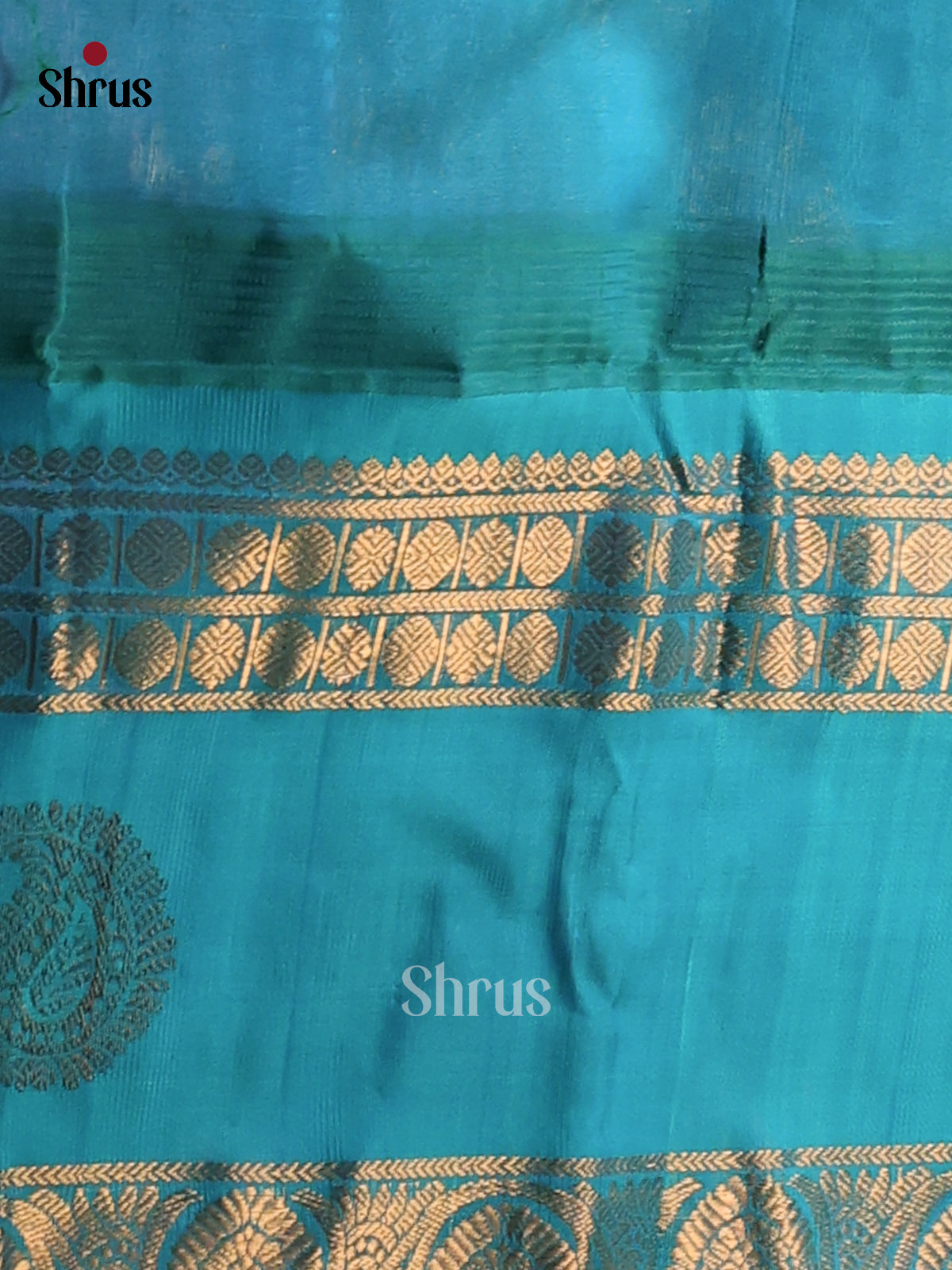 Vibrant Blue Silk Cotton Saree gleams with gold zari buttas & contrast teal brocade pallu - Shop on Shrus.com